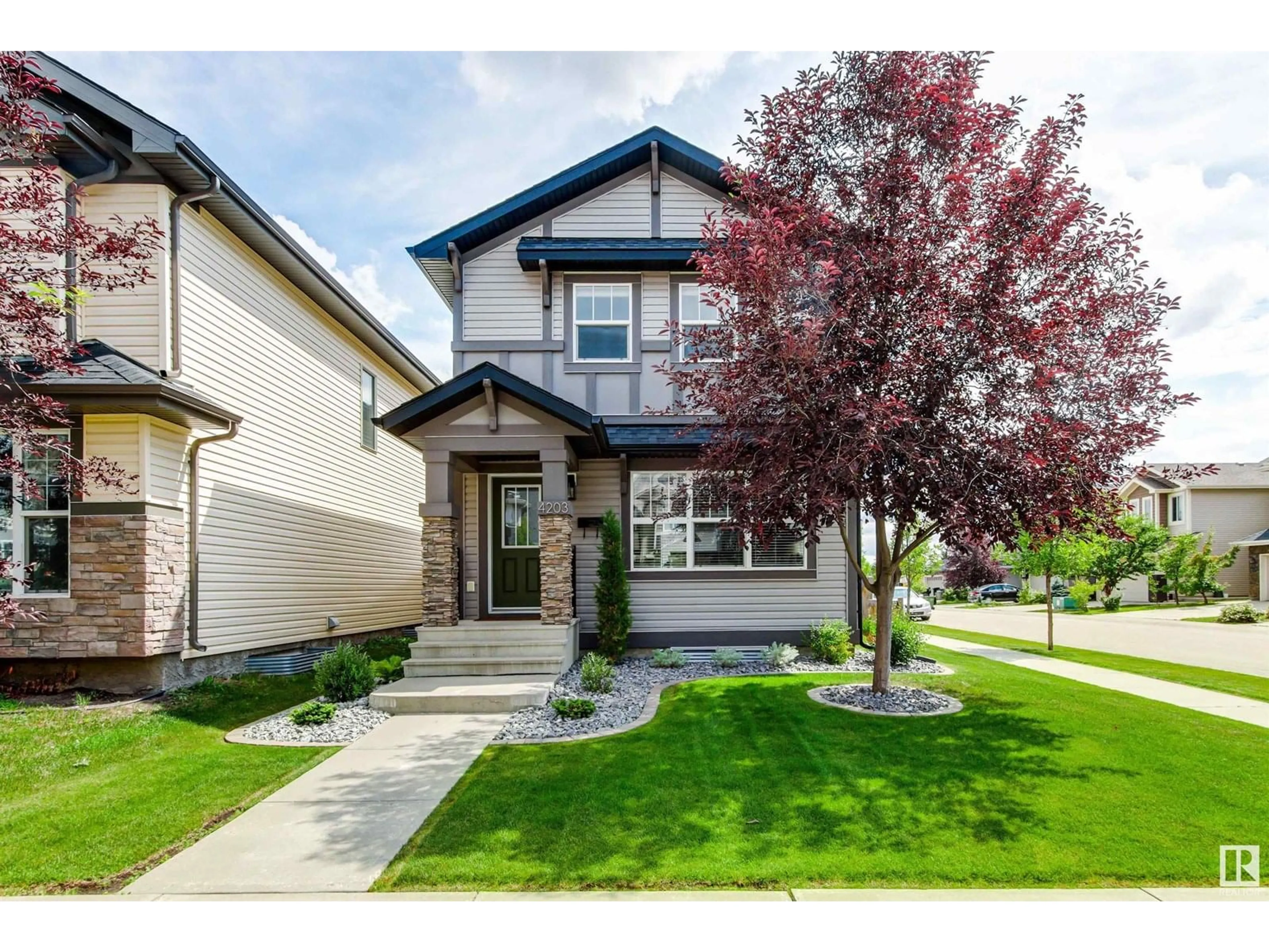 Home with vinyl exterior material, street for 4203 ALEXANDER BA, Edmonton Alberta T6W2C8