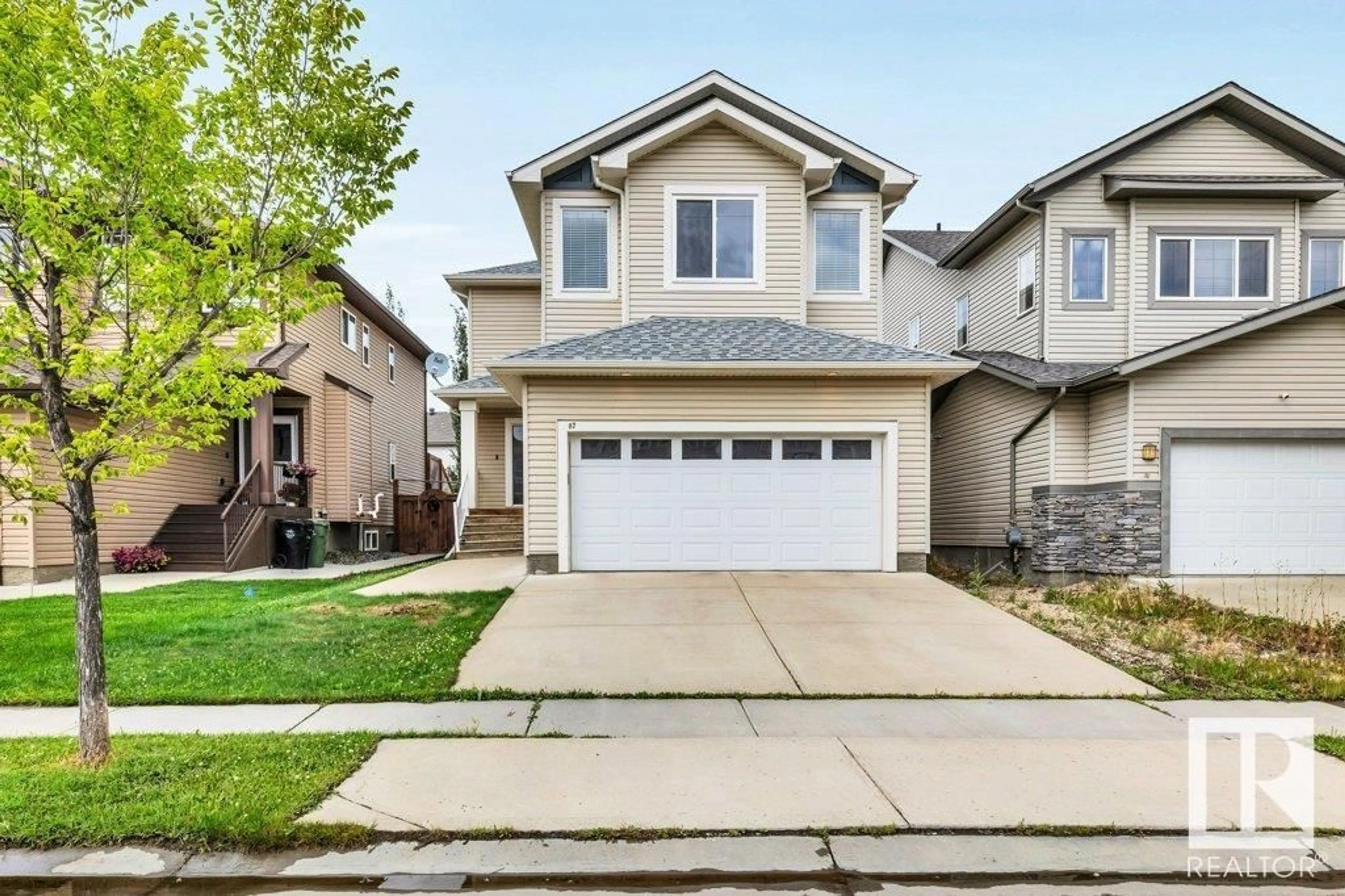 Home with vinyl exterior material, street for 92 DUNLOP WD, Leduc Alberta T9E0N2