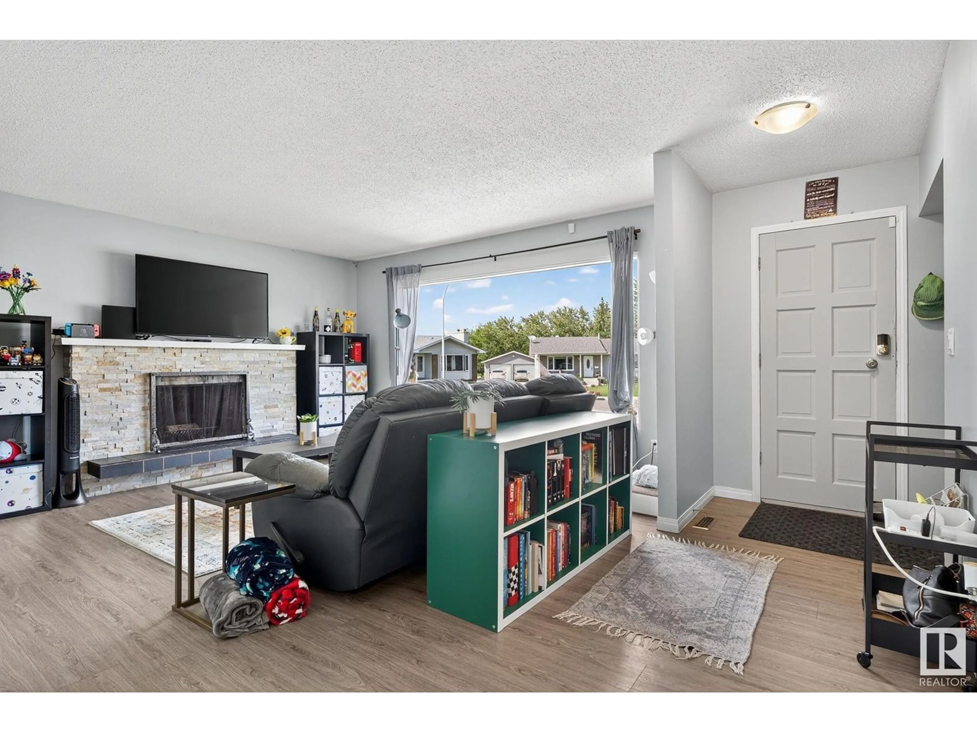 Living room with furniture, unknown for NW - 4723 132 AV, Edmonton Alberta T5A3H1