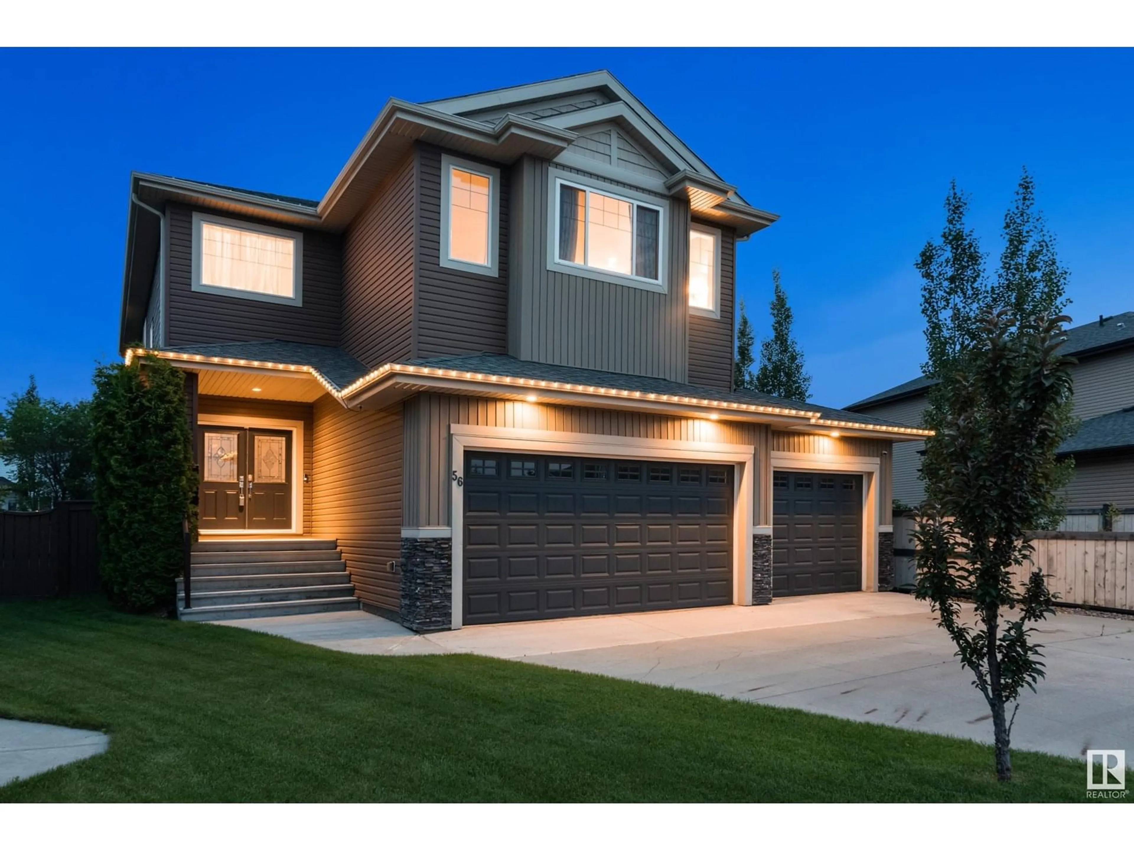 Home with brick exterior material, street for 56 MCKENZIE CL, Leduc Alberta T9E0P2