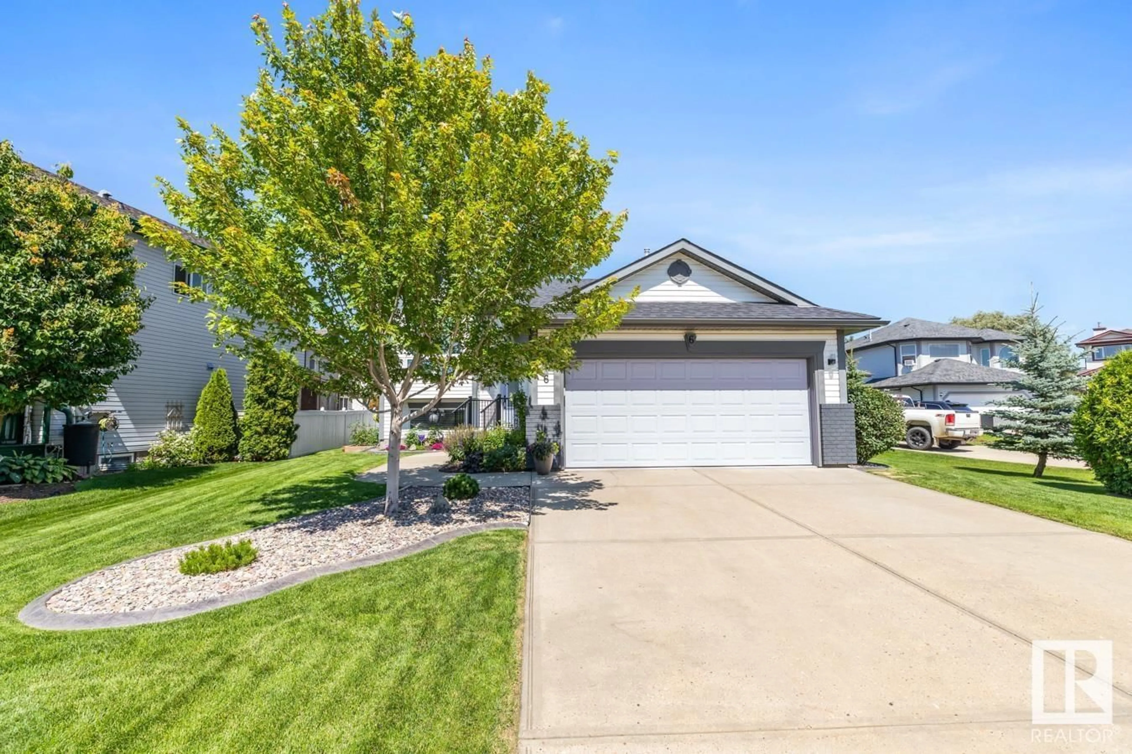 Home with vinyl exterior material, street for 6 BROCHU CO, Beaumont Alberta T4X1N7