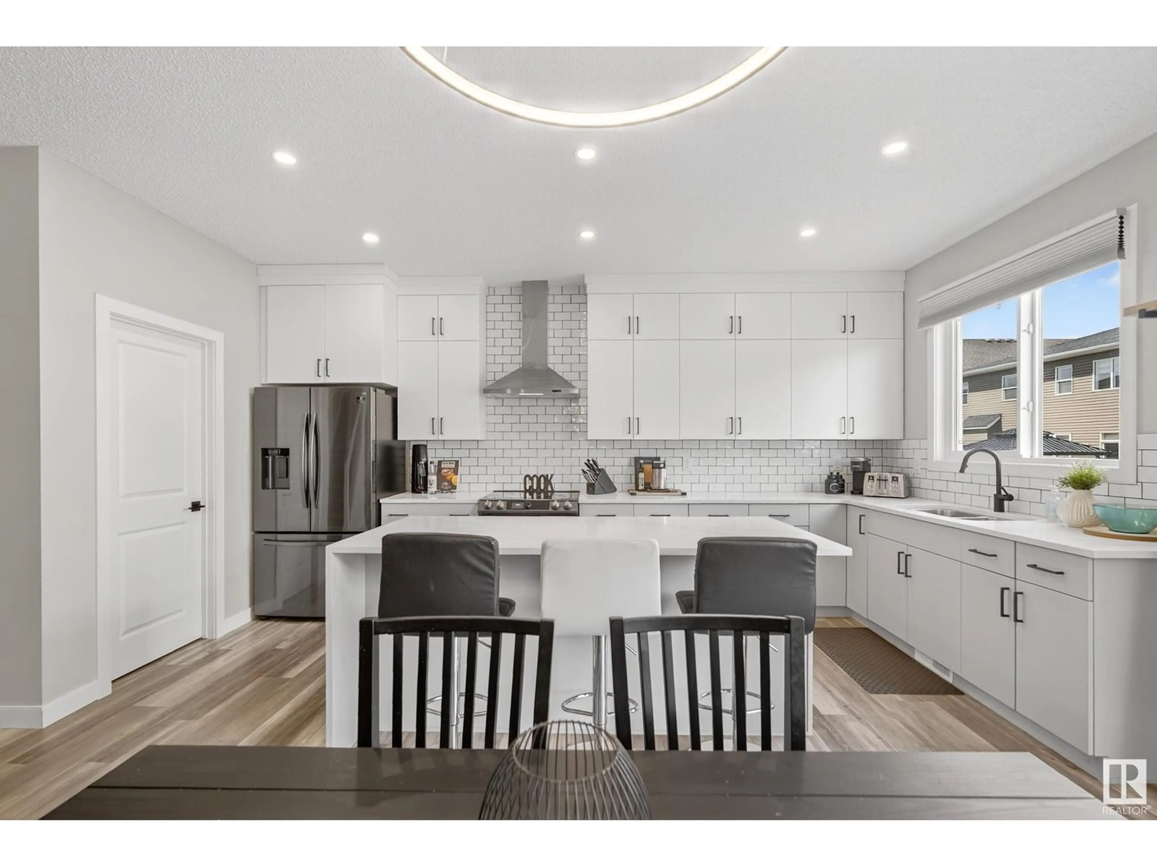 Open concept kitchen, unknown for NW - 20104 15 AV, Edmonton Alberta T6M1L6