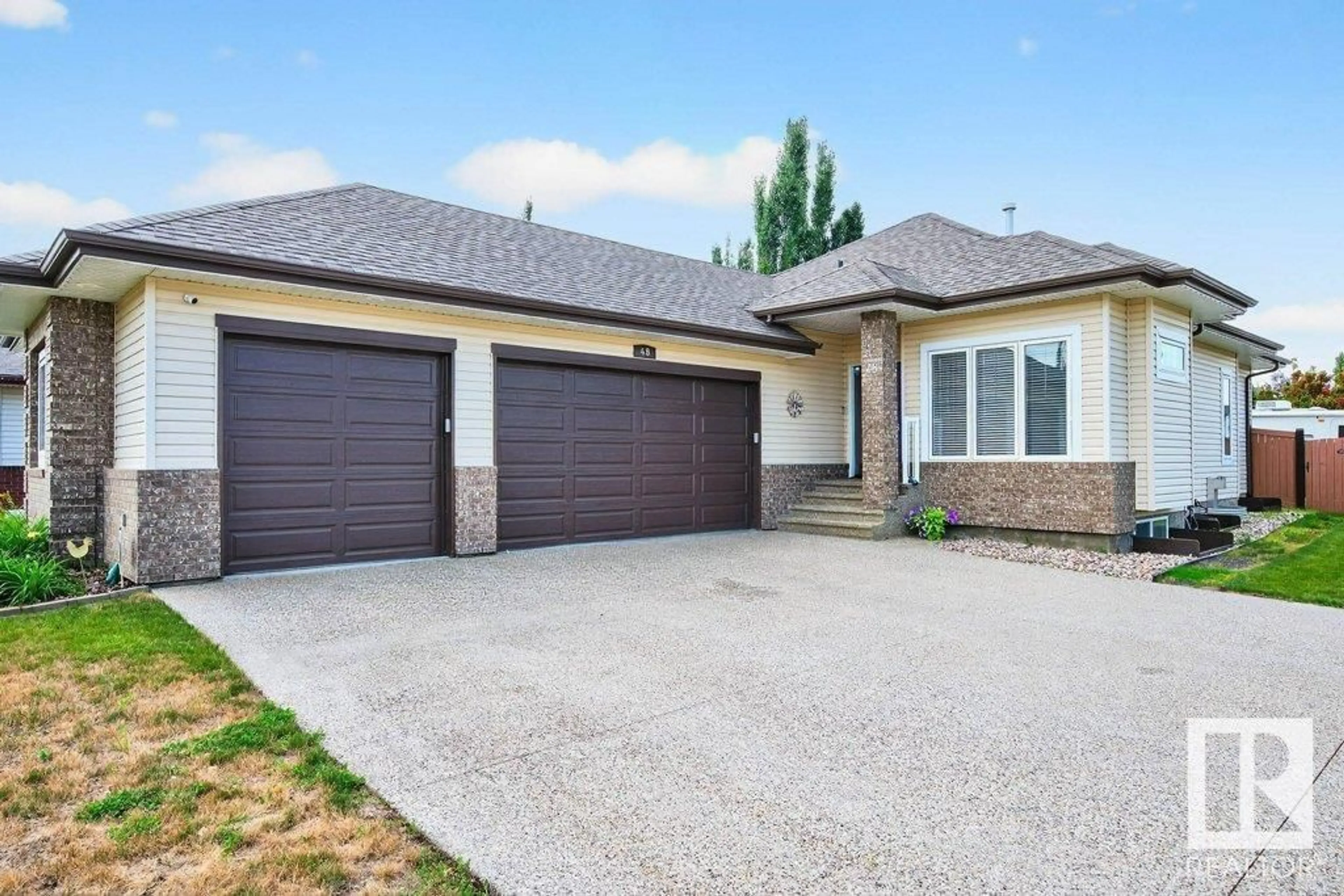 Home with brick exterior material, street for 48 NORMANDEAU CR, St. Albert Alberta T8N3C7