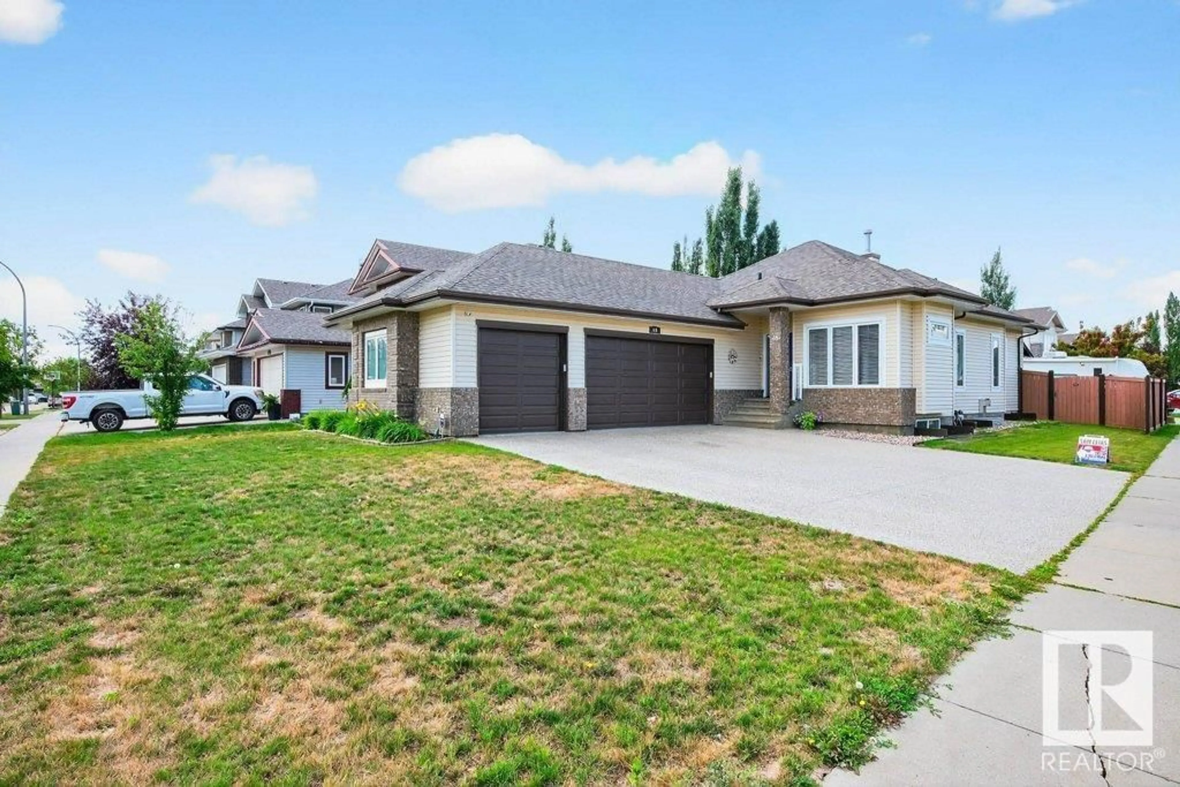 Home with vinyl exterior material, street for 48 NORMANDEAU CR, St. Albert Alberta T8N3C7