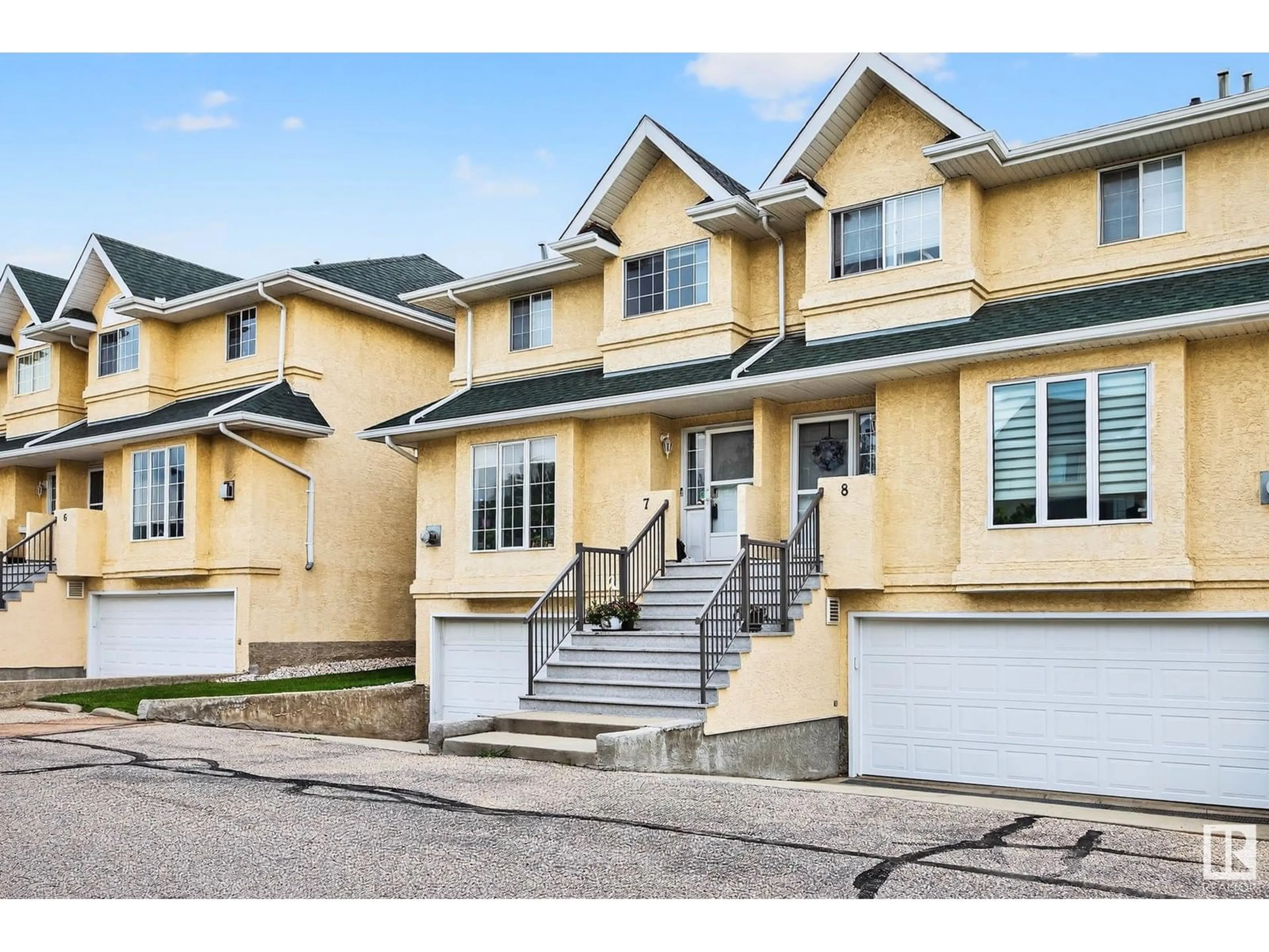 Home with vinyl exterior material, street for #7 - 2419 133 AV, Edmonton Alberta T5A5A5