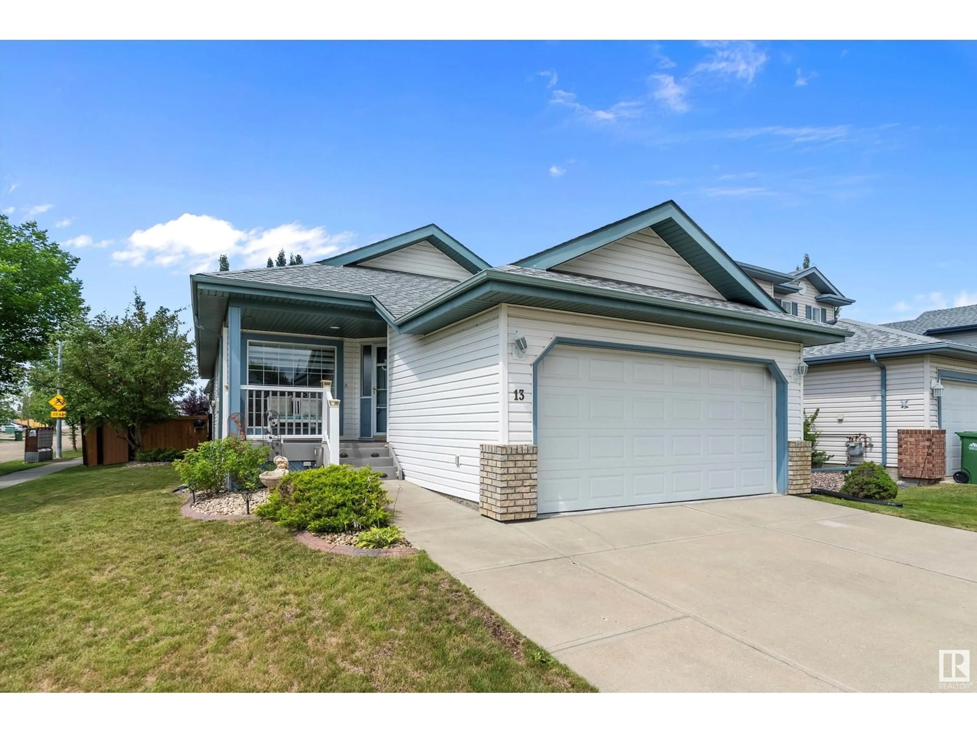 Home with vinyl exterior material, street for 13 NEWMARKET WY, St. Albert Alberta T8N6Y8