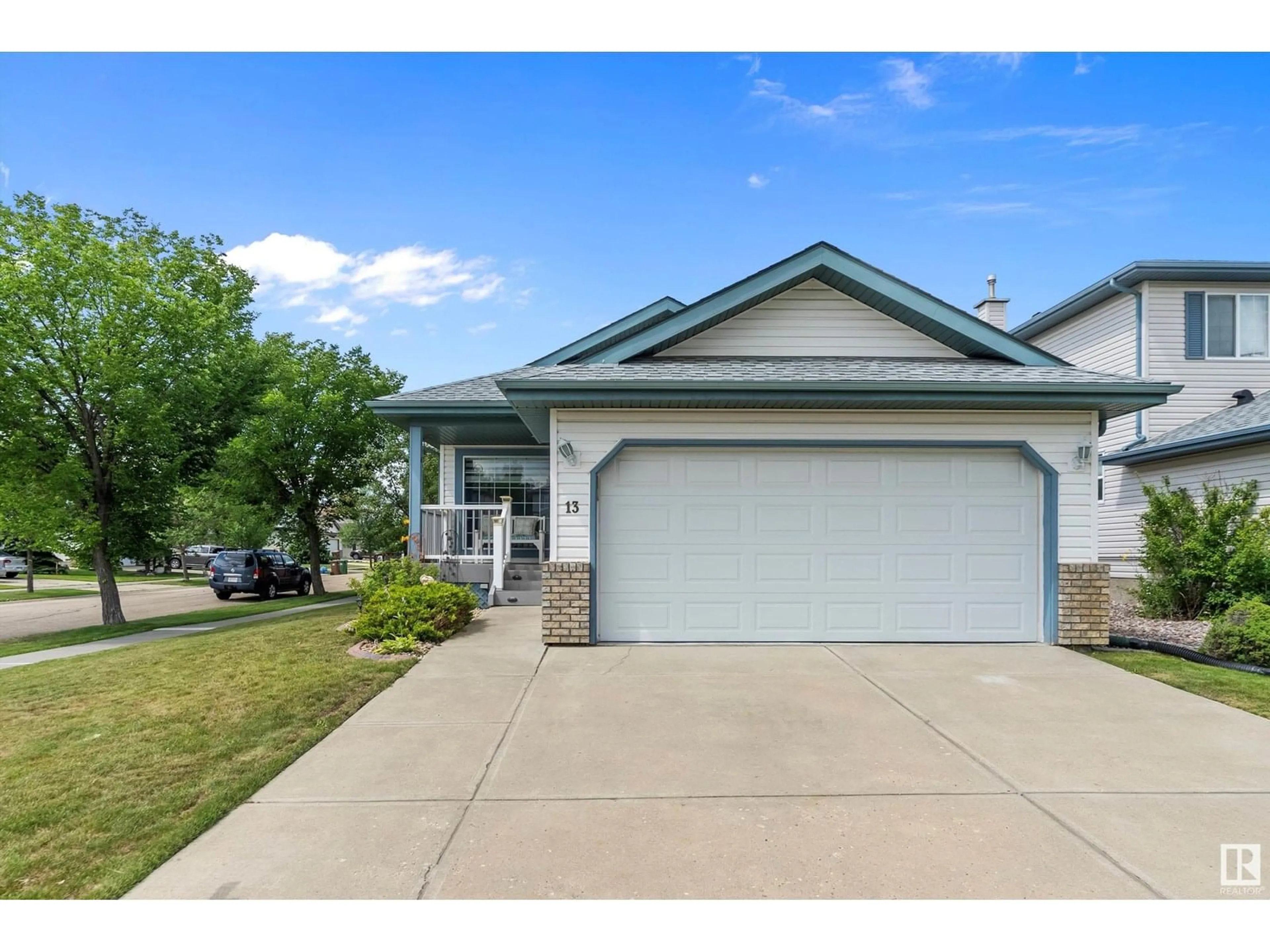 Home with vinyl exterior material, street for 13 NEWMARKET WY, St. Albert Alberta T8N6Y8