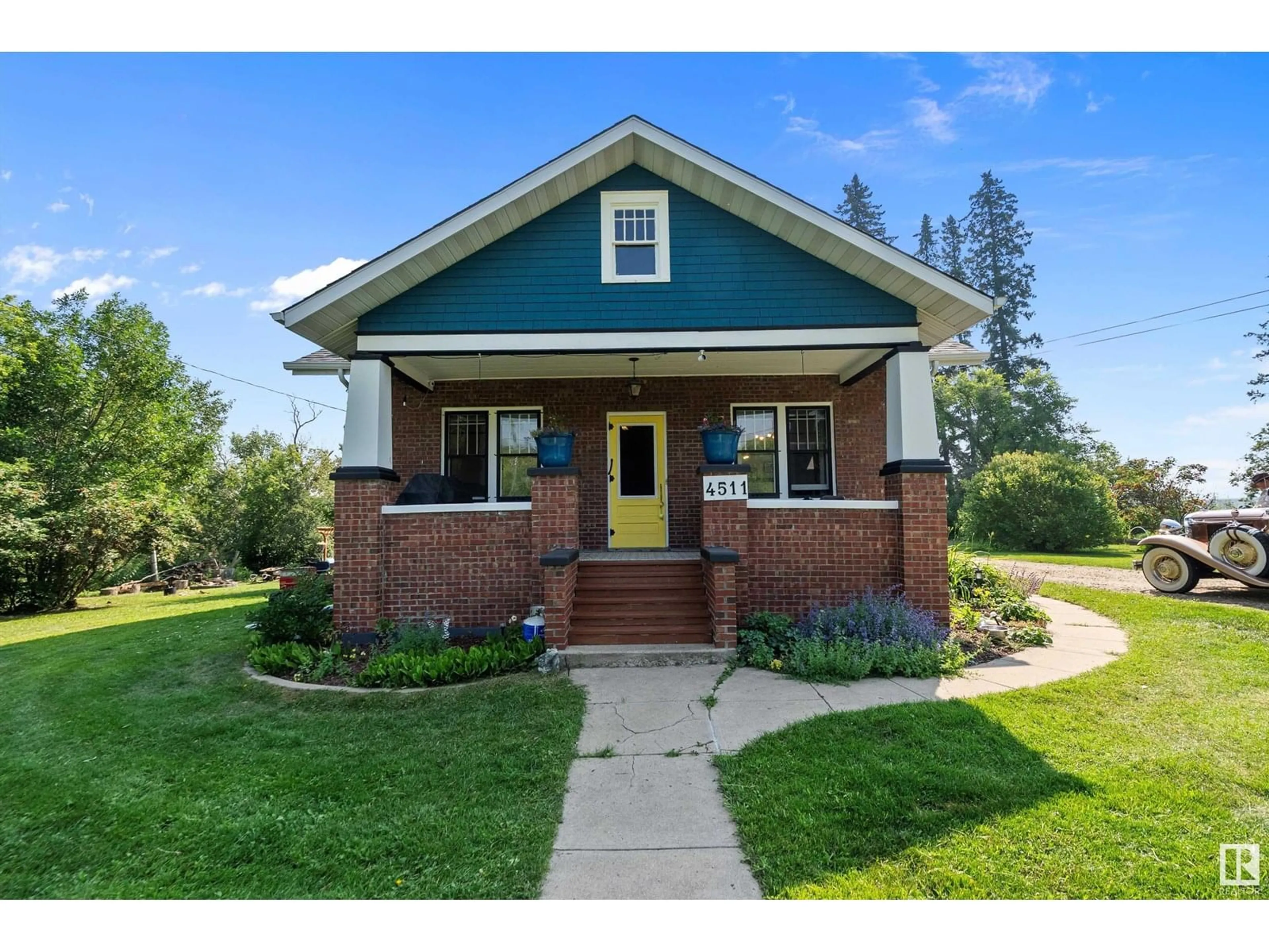 Home with brick exterior material, street for 4511 48 ST, Bruderheim Alberta T0B0S0
