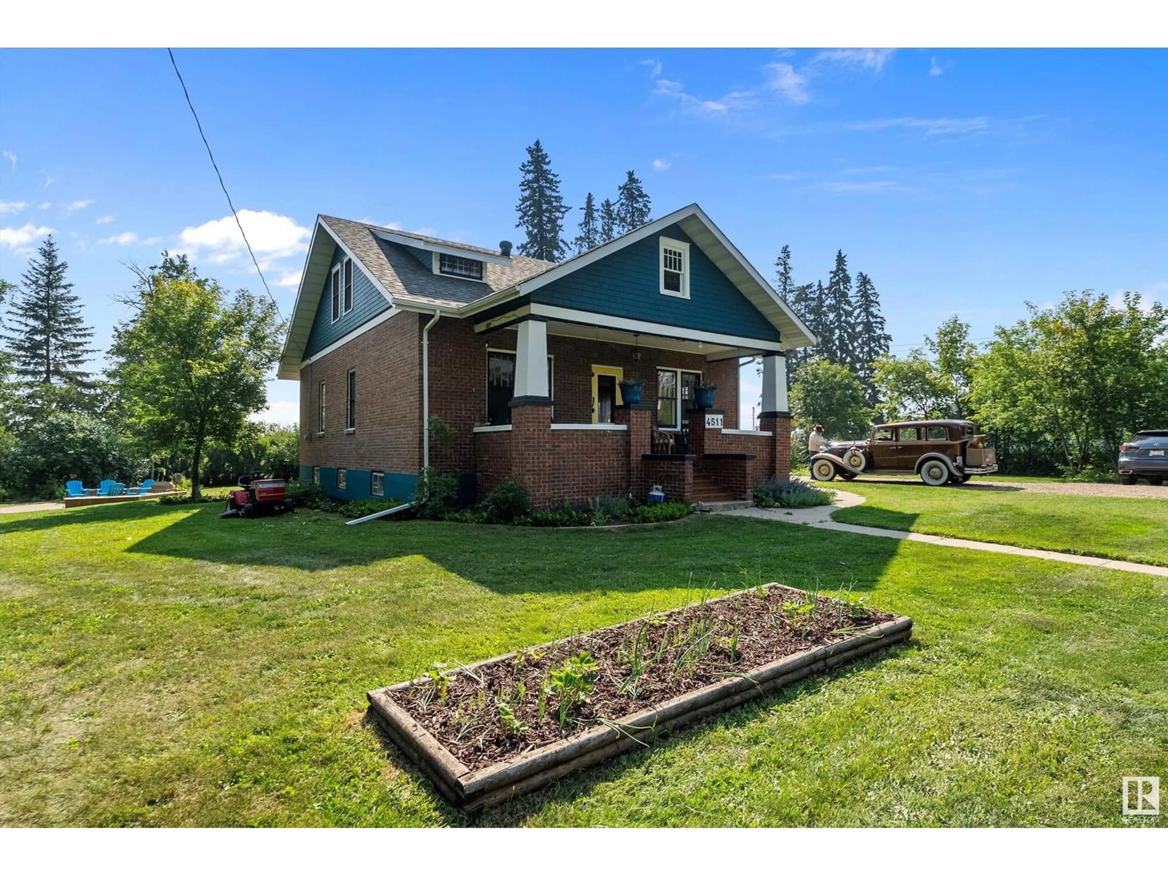 Home with brick exterior material, street for 4511 48 ST, Bruderheim Alberta T0B0S0