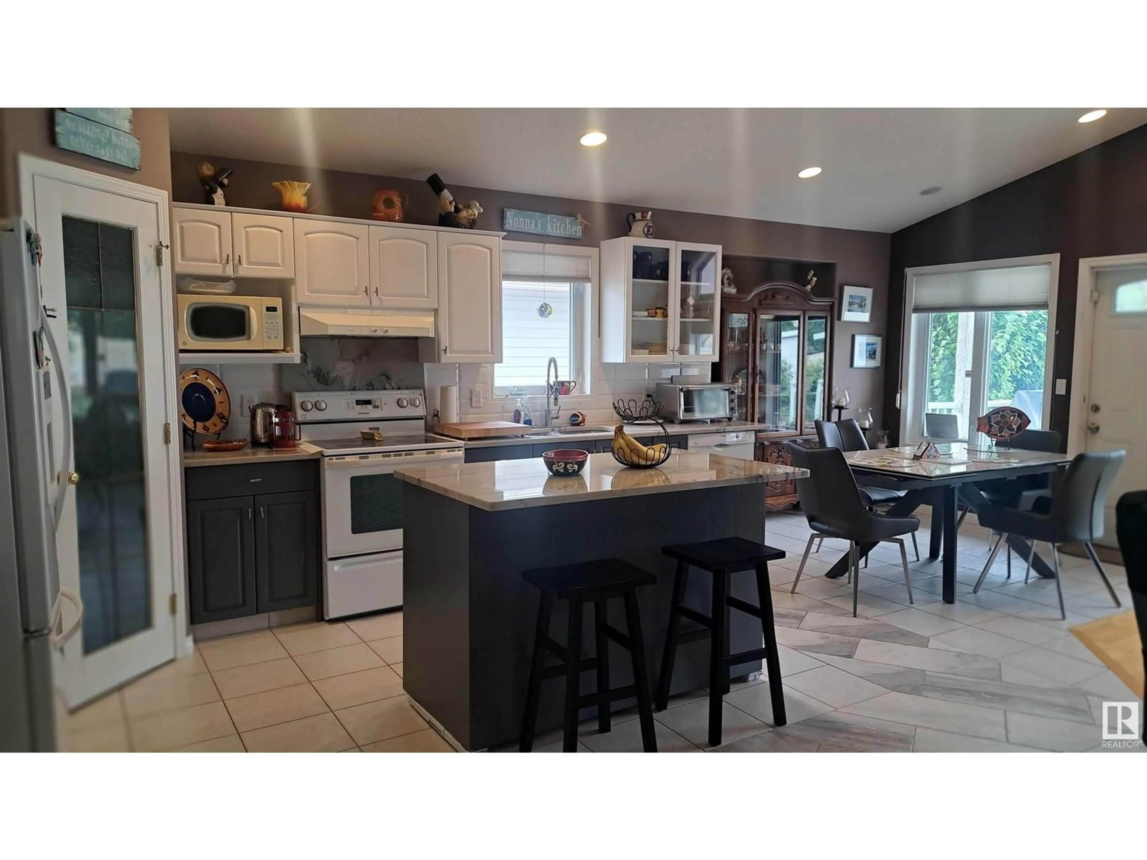 Open concept kitchen, ceramic/tile floor for NW - 10316 156 AV, Edmonton Alberta T5X6B4
