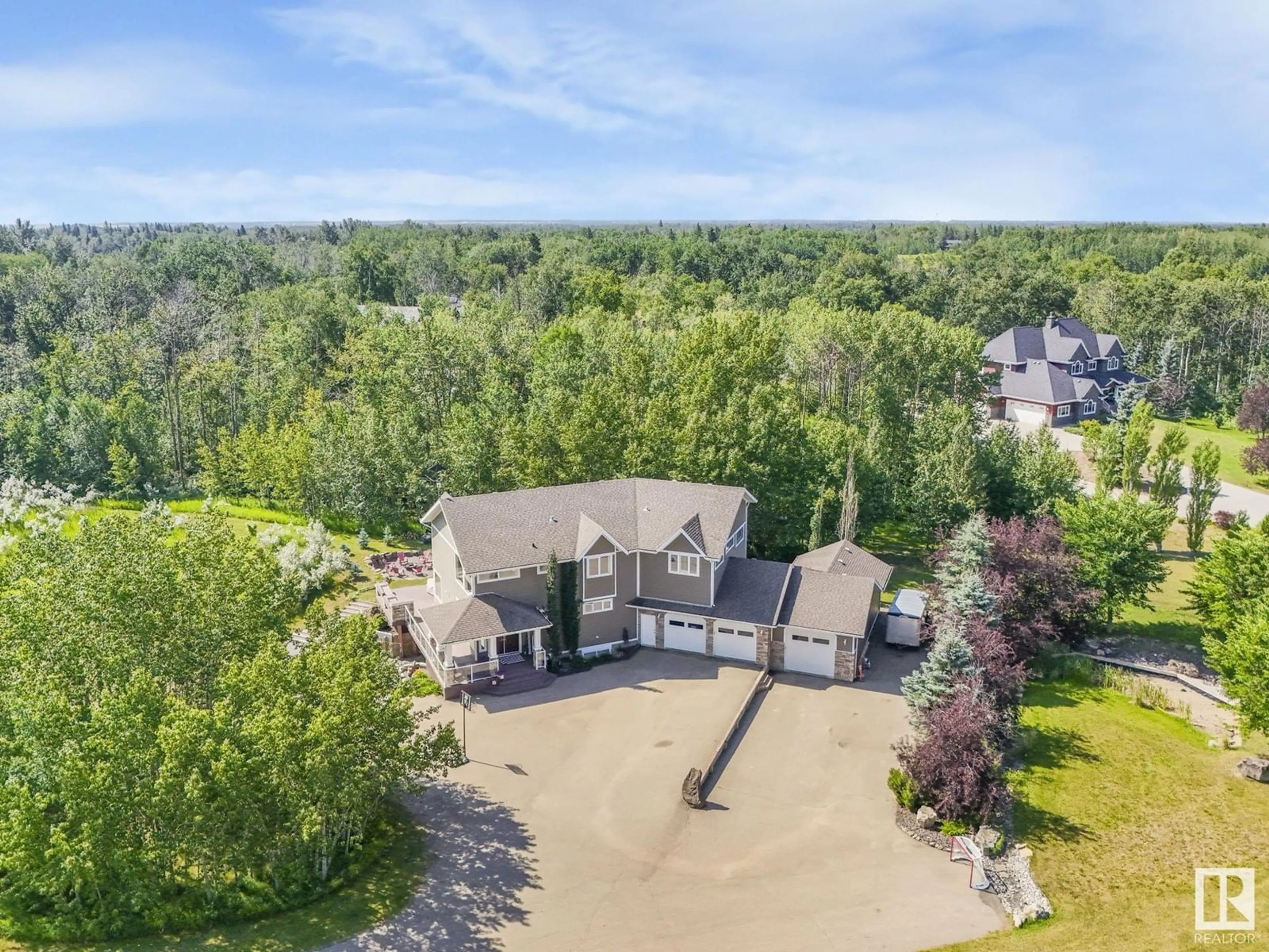 A pic from outside/outdoor area/front of a property/back of a property/a pic from drone, unknown for 51222 RGE ROAD 260, Rural Parkland County Alberta T7Y1B1