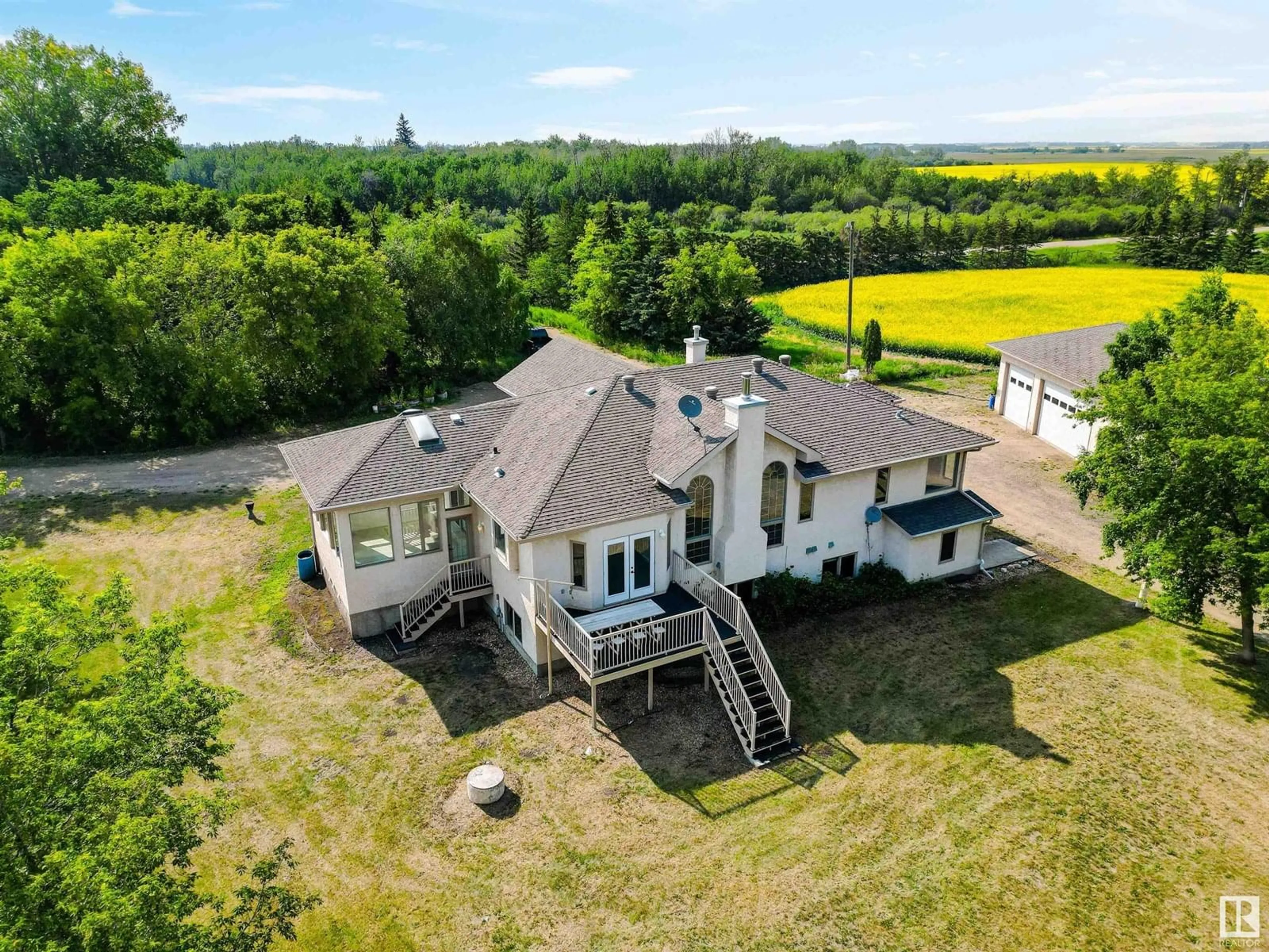 A pic from outside/outdoor area/front of a property/back of a property/a pic from drone, building for 55023 RGE ROAD 254, Rural Sturgeon County Alberta T8T0T2