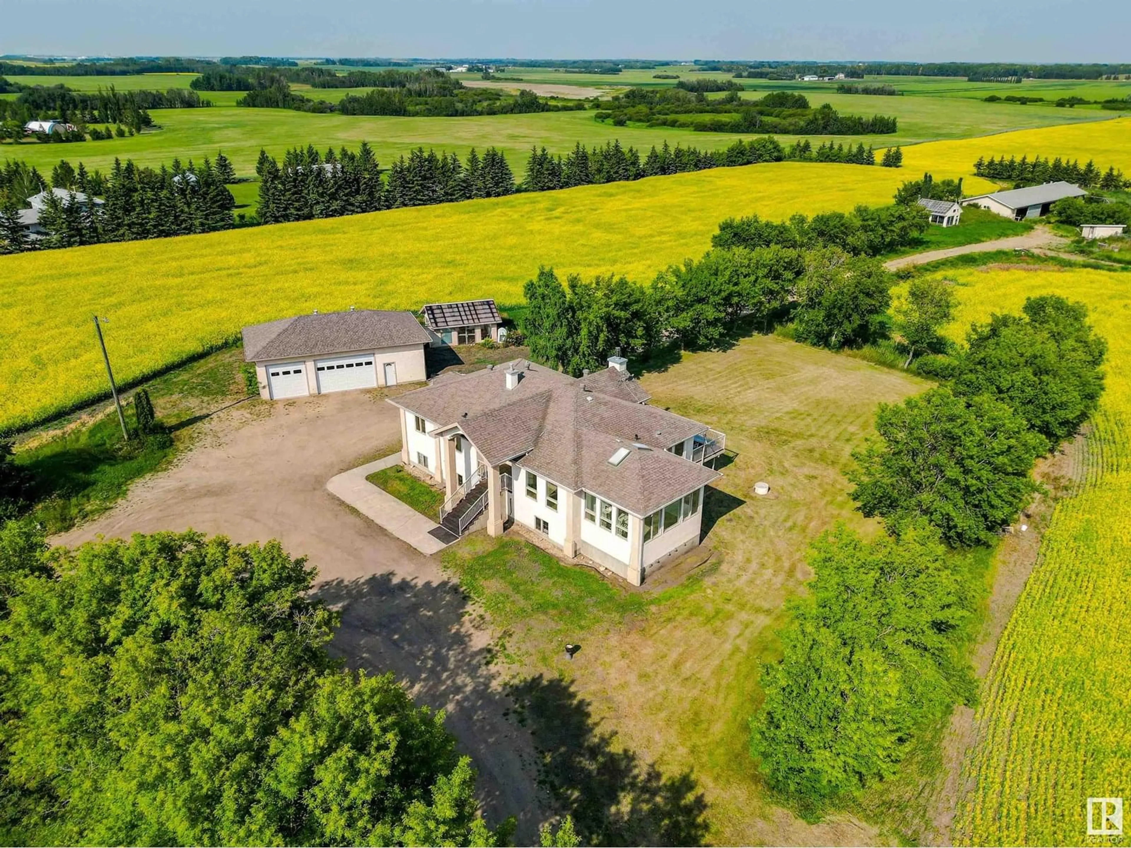 A pic from outside/outdoor area/front of a property/back of a property/a pic from drone, building for 55023 RGE ROAD 254, Rural Sturgeon County Alberta T8T0T2