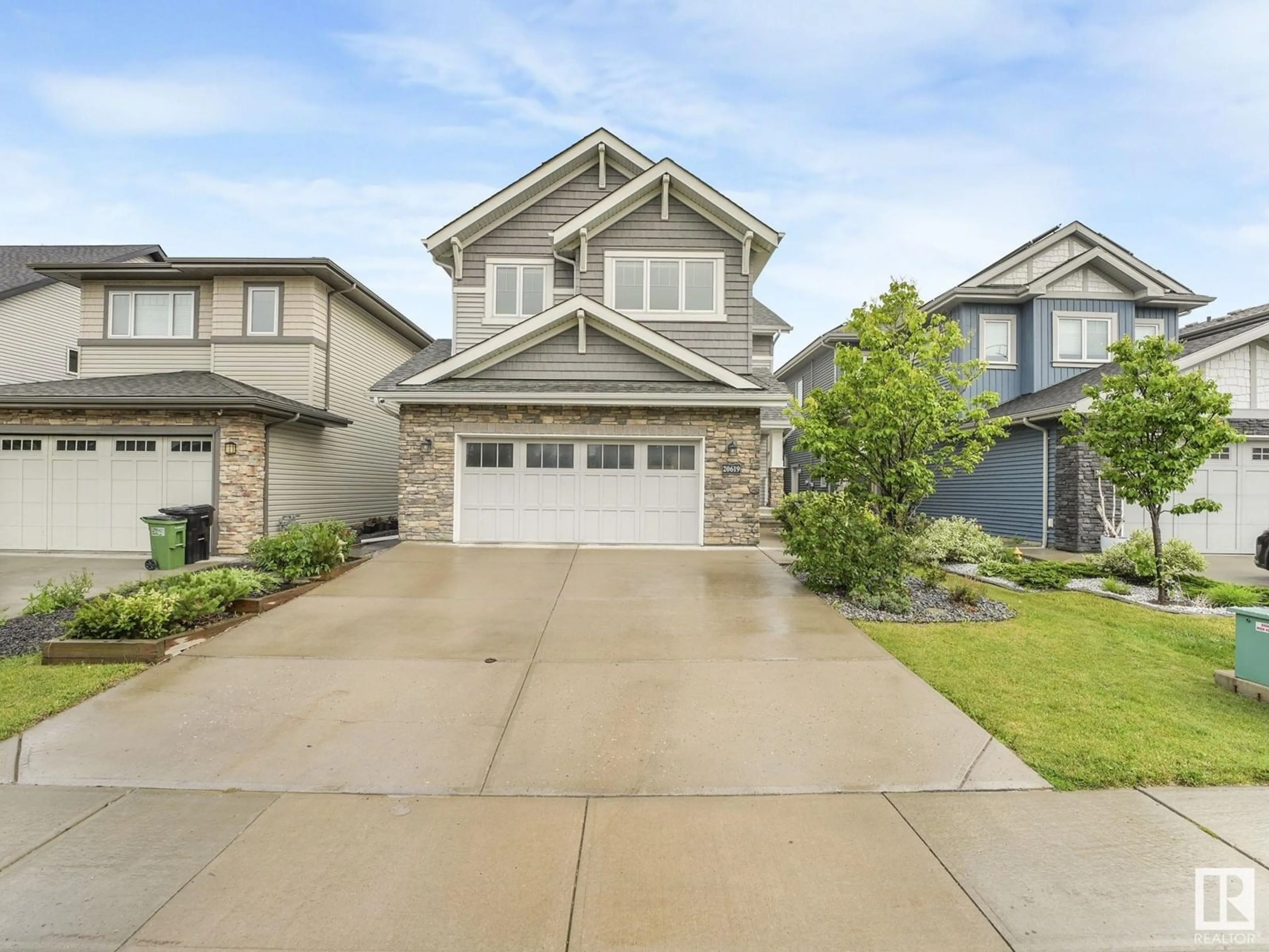 Home with vinyl exterior material, street for NW - 20619 130 AV, Edmonton Alberta T5S0J4