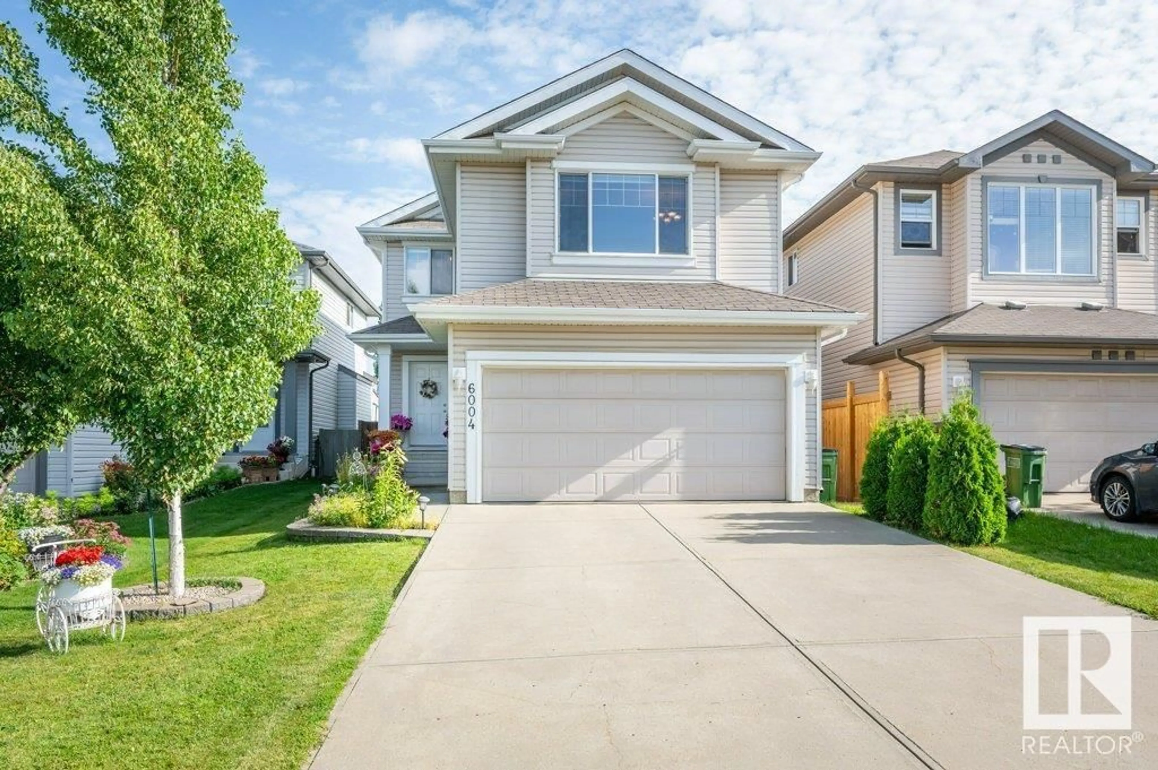 Home with vinyl exterior material, street for SW - 6004 5 AV, Edmonton Alberta T6X0E9