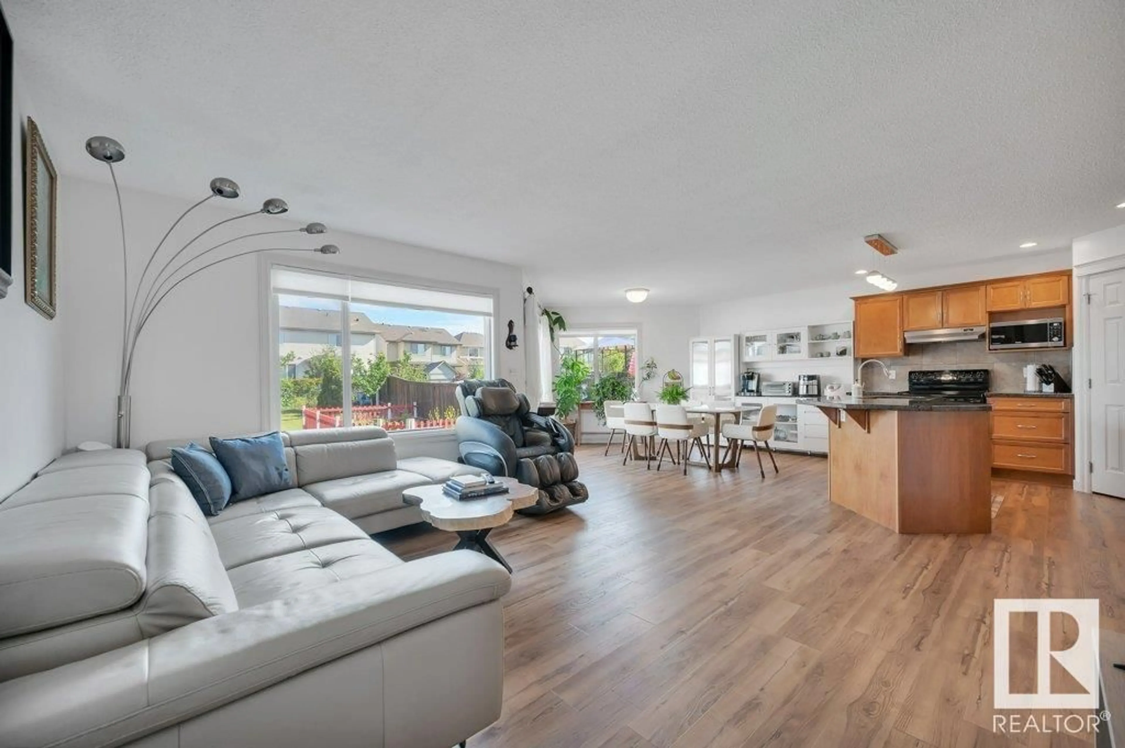 Living room with furniture, unknown for SW - 6004 5 AV, Edmonton Alberta T6X0E9