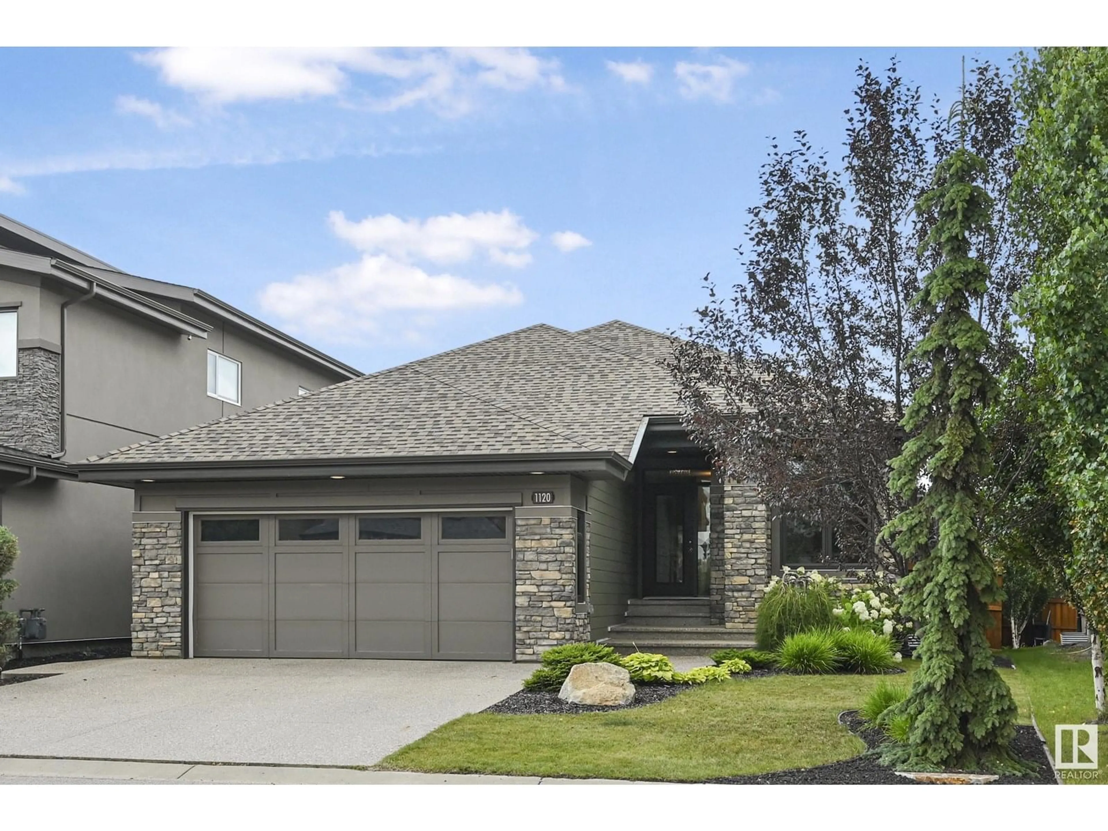 Home with brick exterior material, street for GR SW - 1120 HAINSTOCK GREEN, Edmonton Alberta T6W2T8