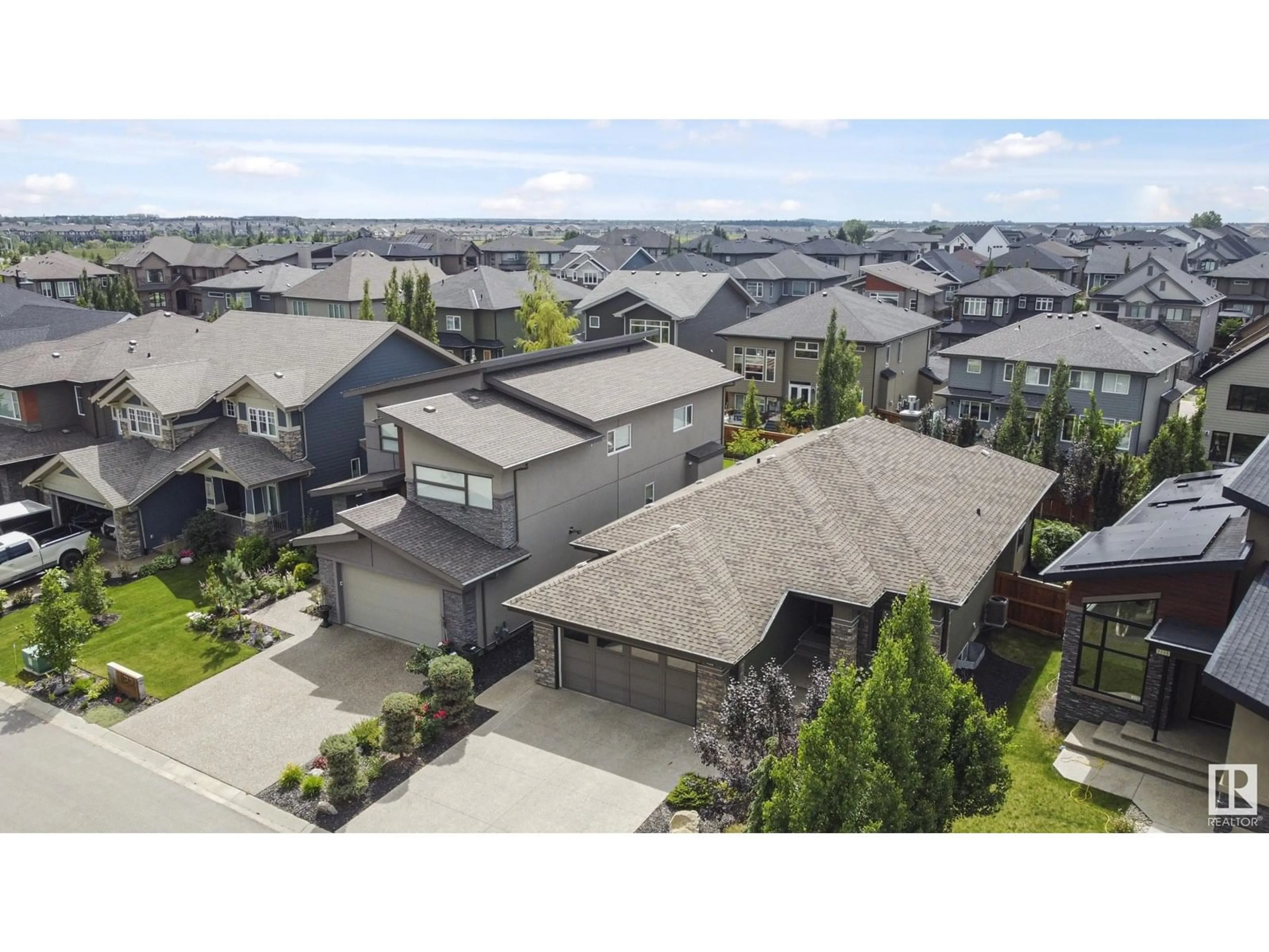 A pic from outside/outdoor area/front of a property/back of a property/a pic from drone, street for GR SW - 1120 HAINSTOCK GREEN, Edmonton Alberta T6W2T8