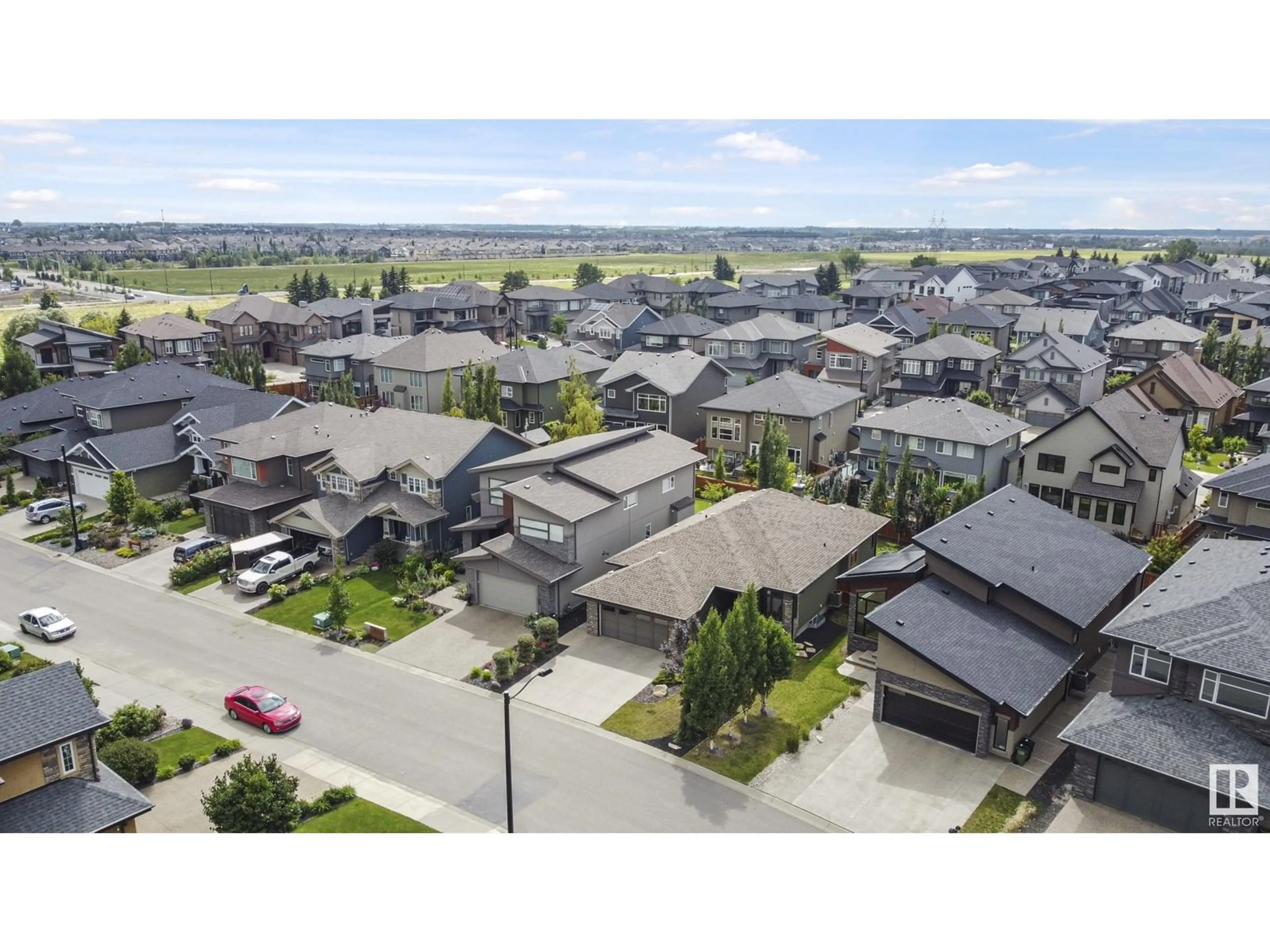 A pic from outside/outdoor area/front of a property/back of a property/a pic from drone, street for GR SW - 1120 HAINSTOCK GREEN, Edmonton Alberta T6W2T8