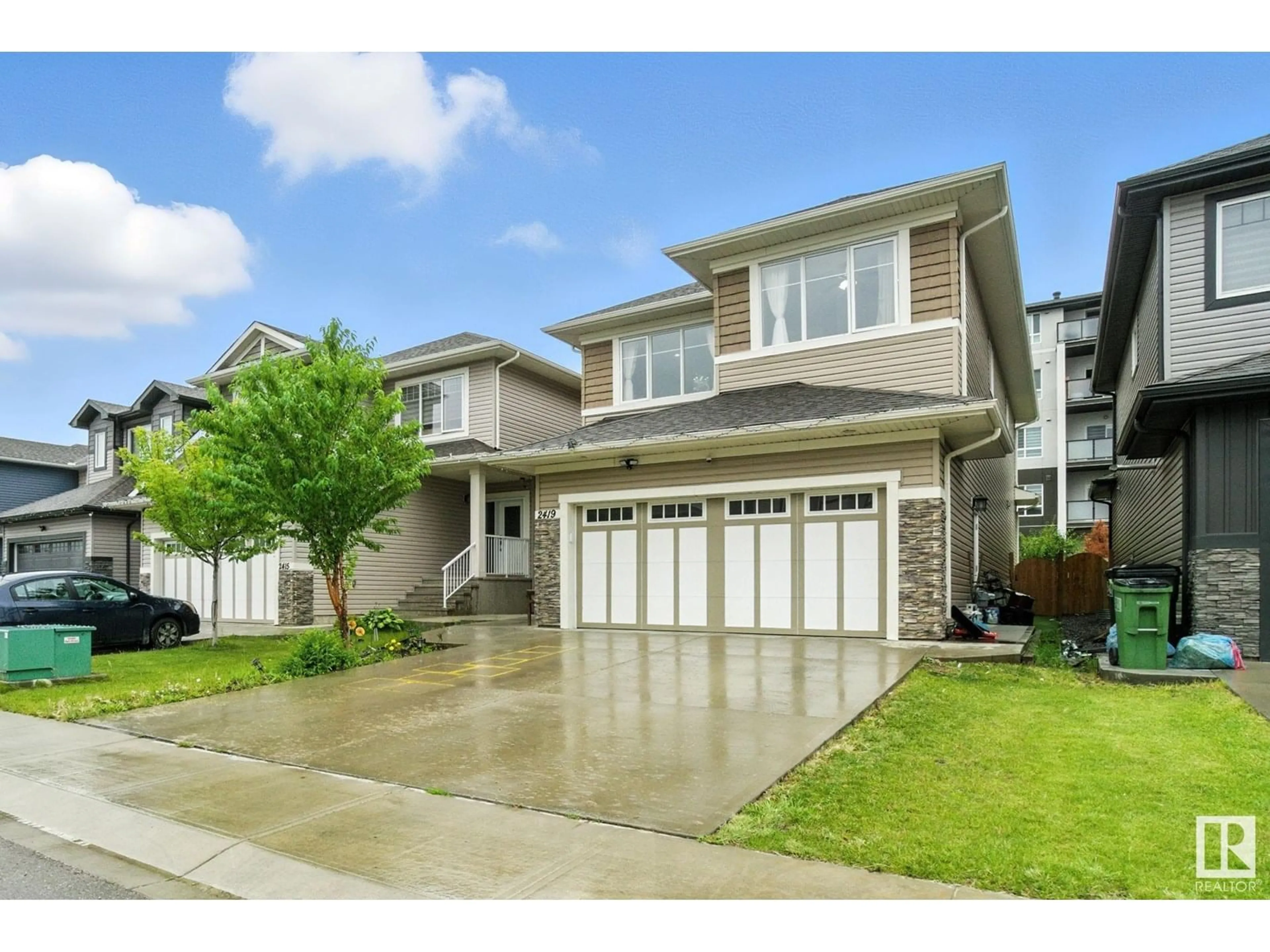 Home with vinyl exterior material, street for 2419 17 AV, Edmonton Alberta T6T2G8
