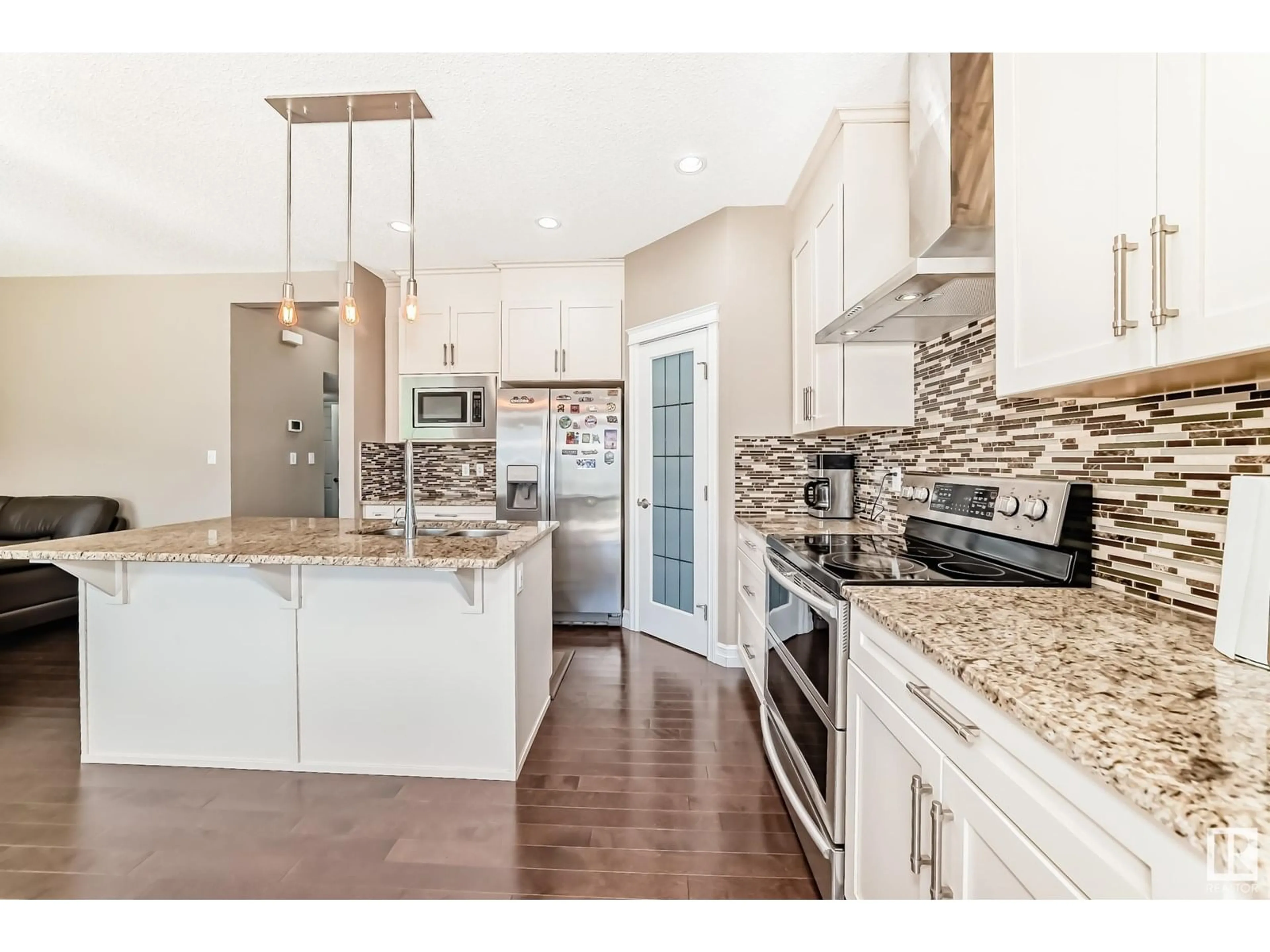 Open concept kitchen, ceramic/tile floor for NW - 16311 135 ST, Edmonton Alberta T6V0J9