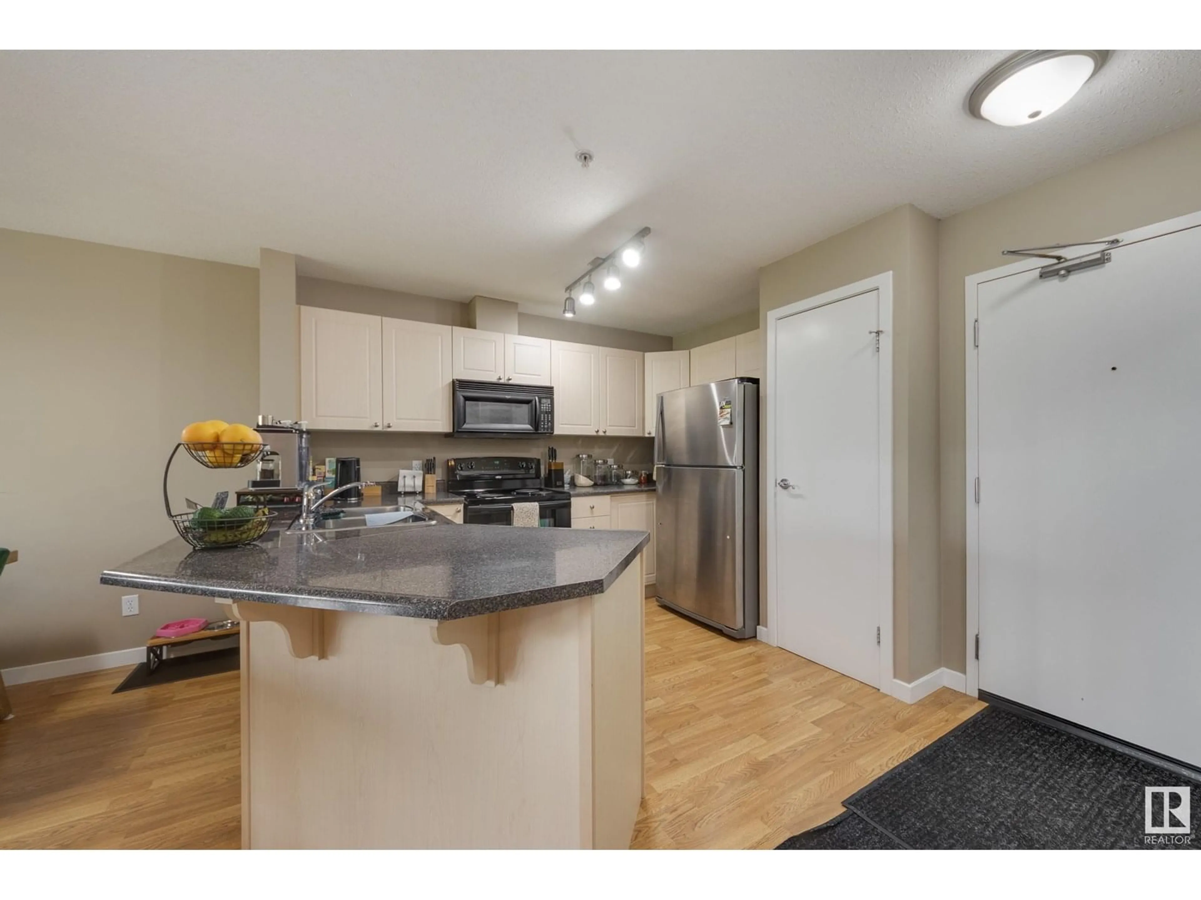 Standard kitchen, wood/laminate floor for #314 - 4312 139 AV, Edmonton Alberta T5Y3J4