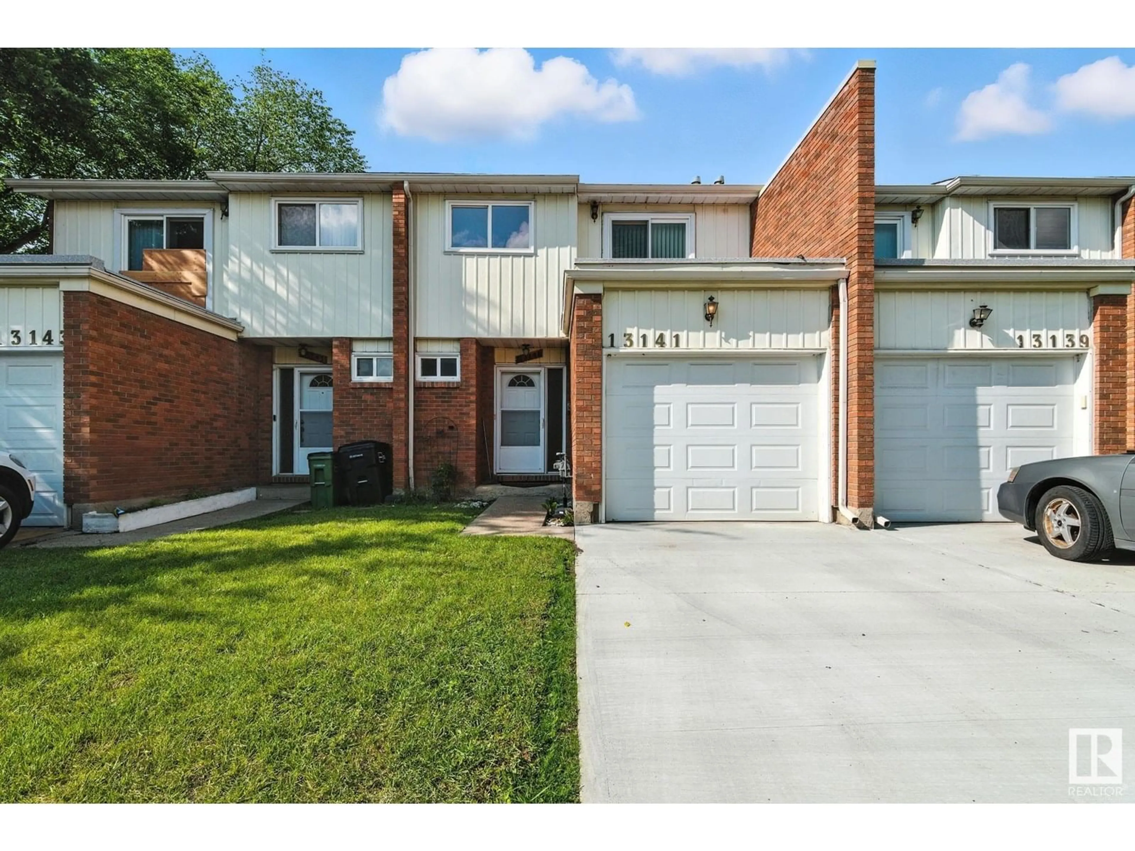 Home with brick exterior material, street for 13141 34 ST, Edmonton Alberta T5A3K1