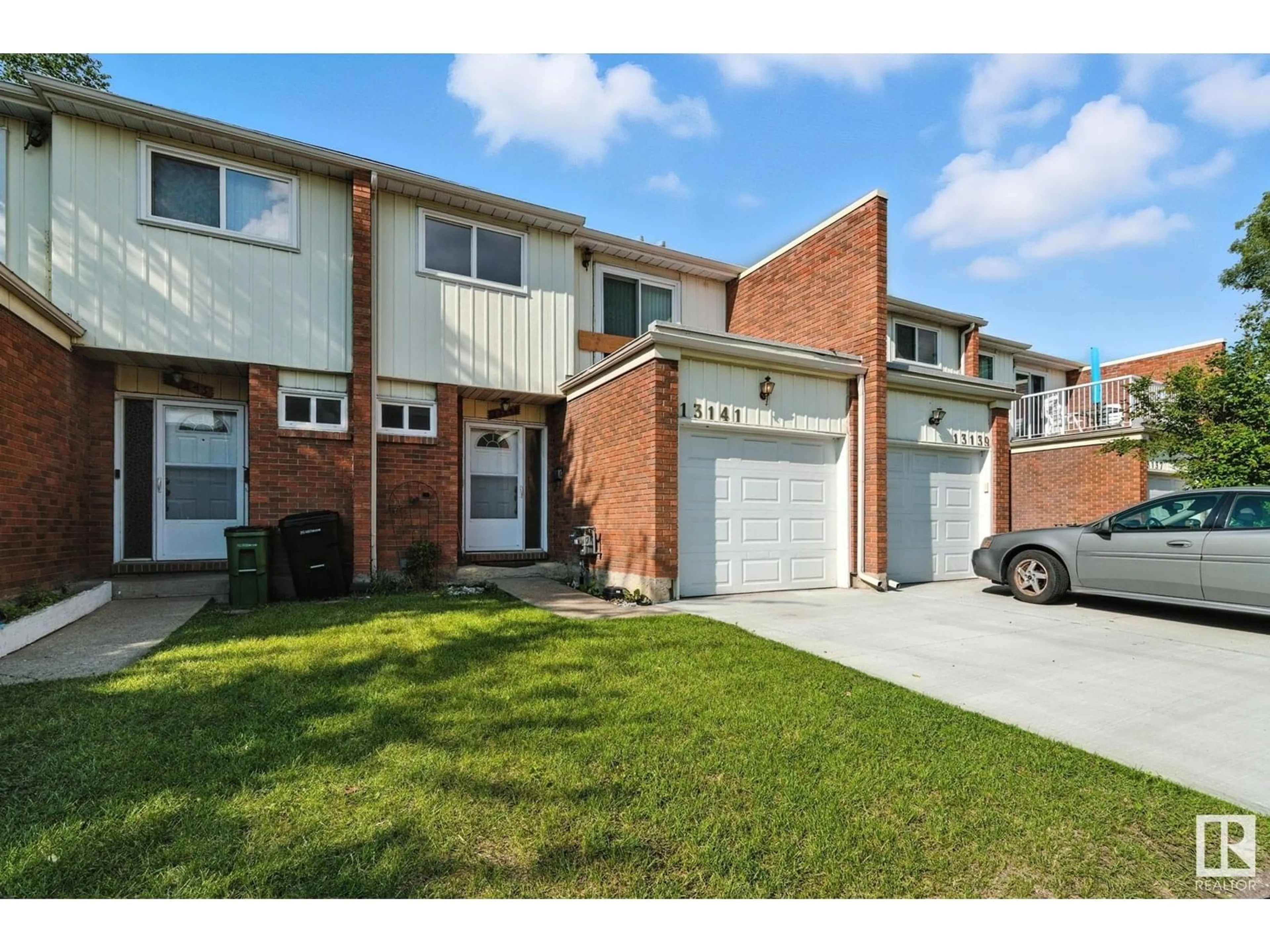 Home with brick exterior material, street for 13141 34 ST, Edmonton Alberta T5A3K1