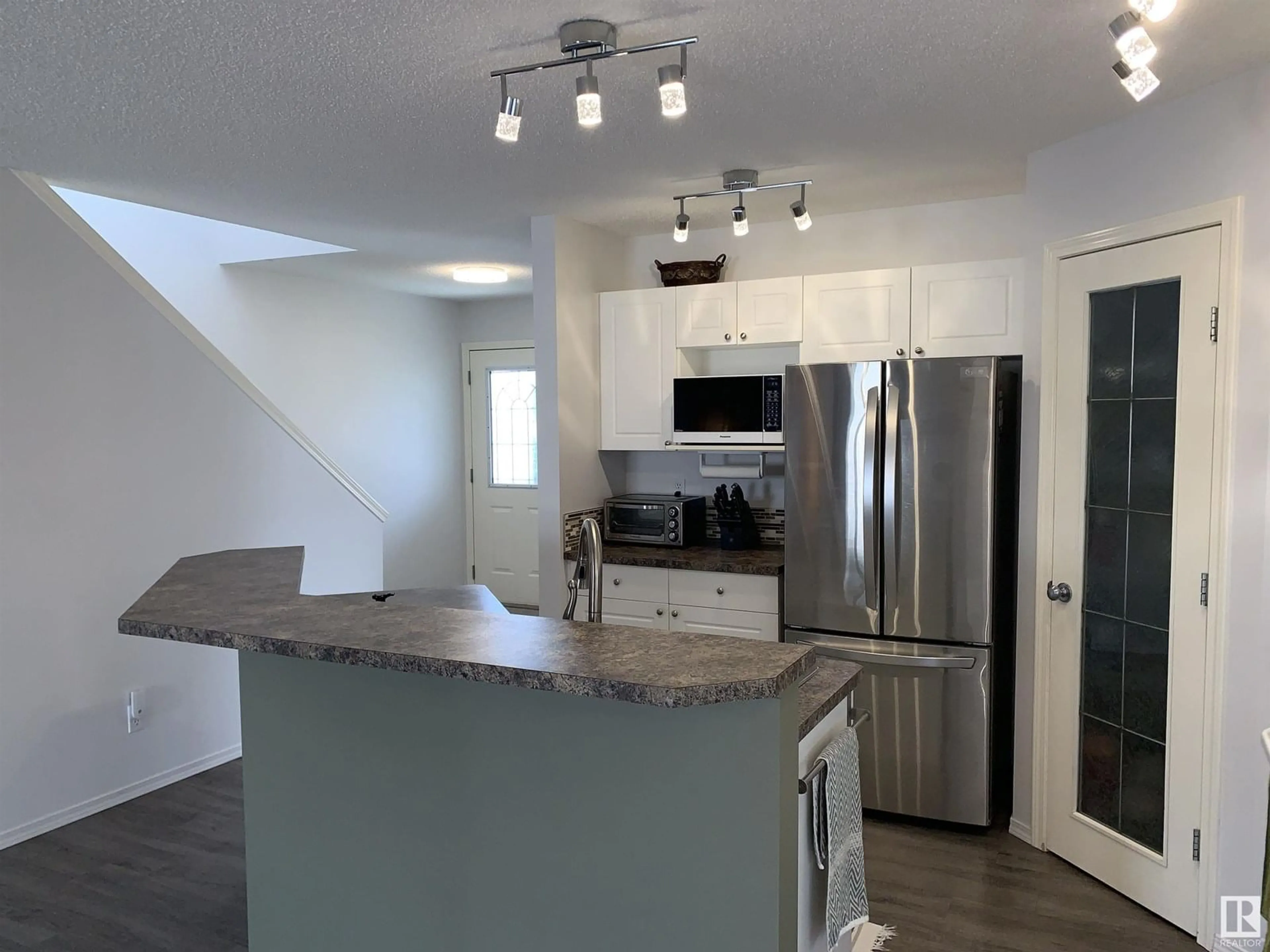 Open concept kitchen, unknown for 207 ARBOUR MEADOWS CL, Calgary Alberta T3G5J3