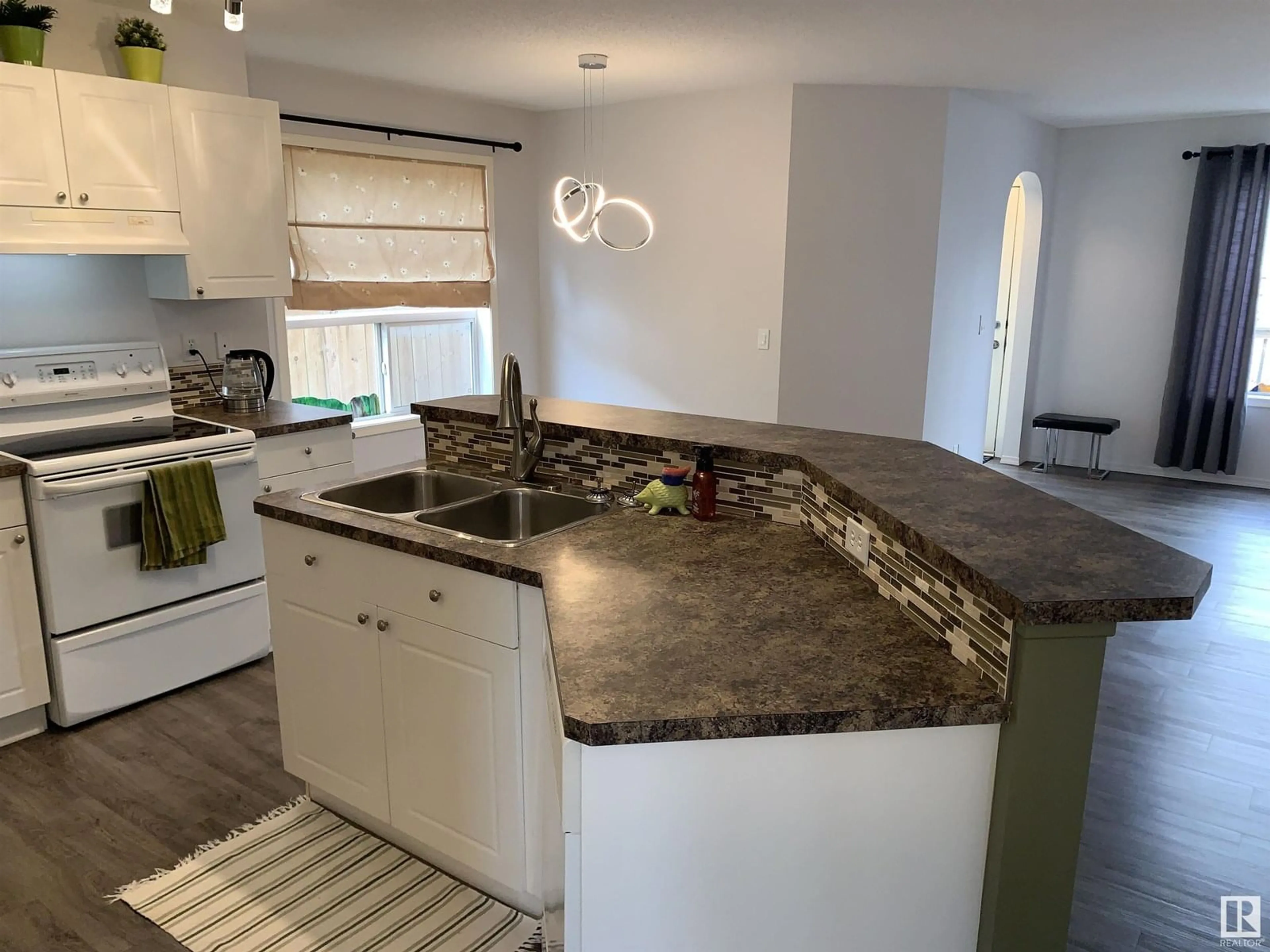 Open concept kitchen, unknown for 207 ARBOUR MEADOWS CL, Calgary Alberta T3G5J3