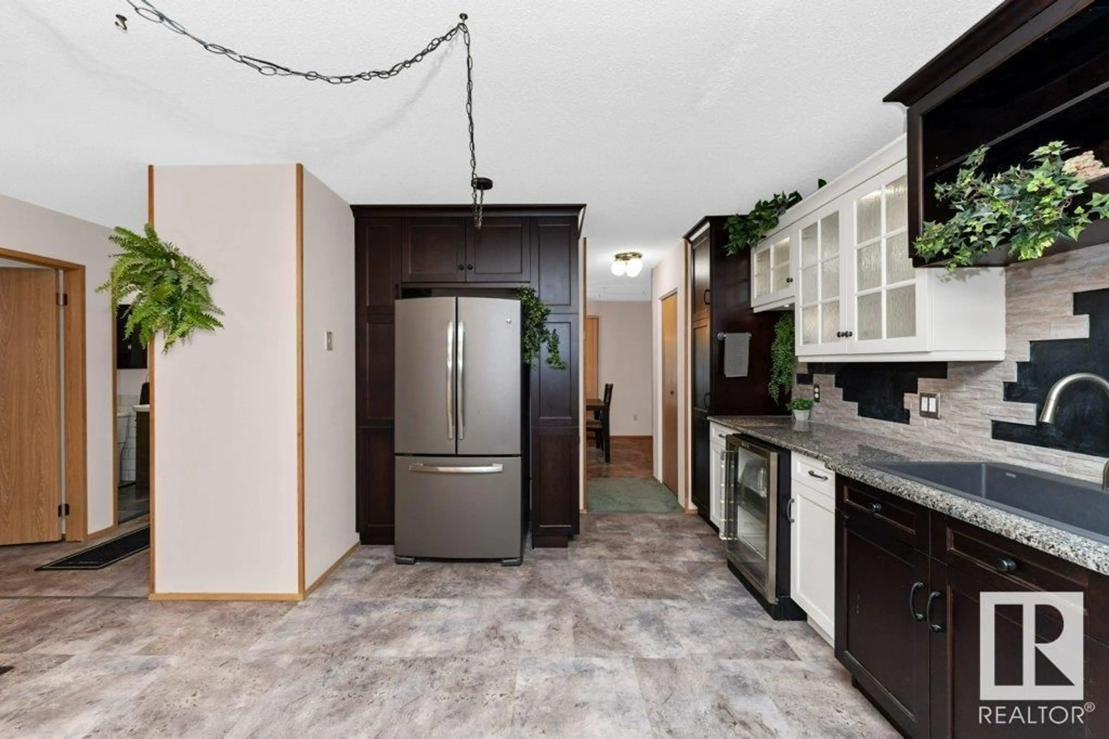 Open concept kitchen, ceramic/tile floor for 145 KNOTTWOOD RD, Edmonton Alberta T6K4B8