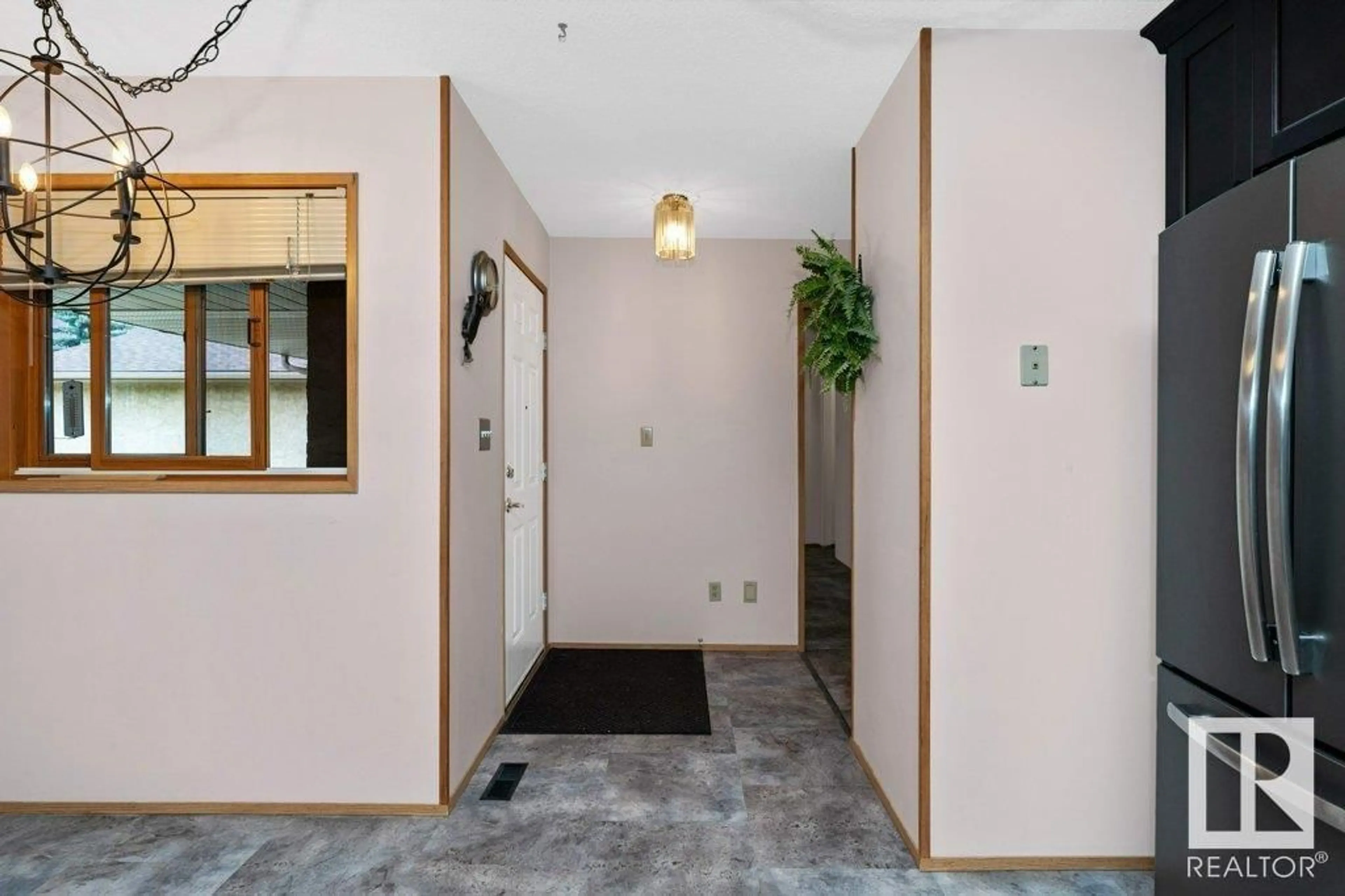 Indoor foyer for 145 KNOTTWOOD RD, Edmonton Alberta T6K4B8