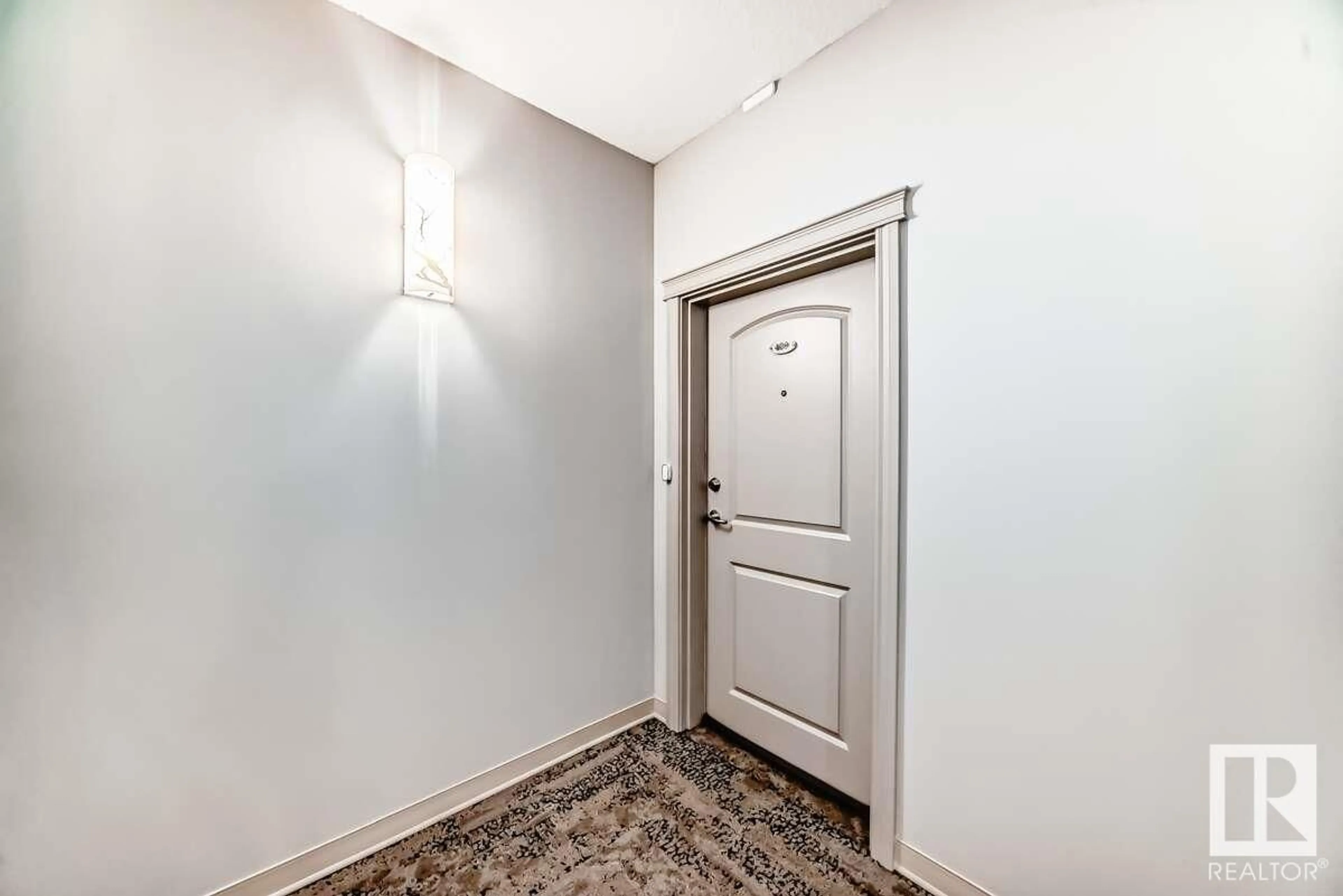 Indoor entryway for #409 - 12408 15 AV, Edmonton Alberta T6W1X2