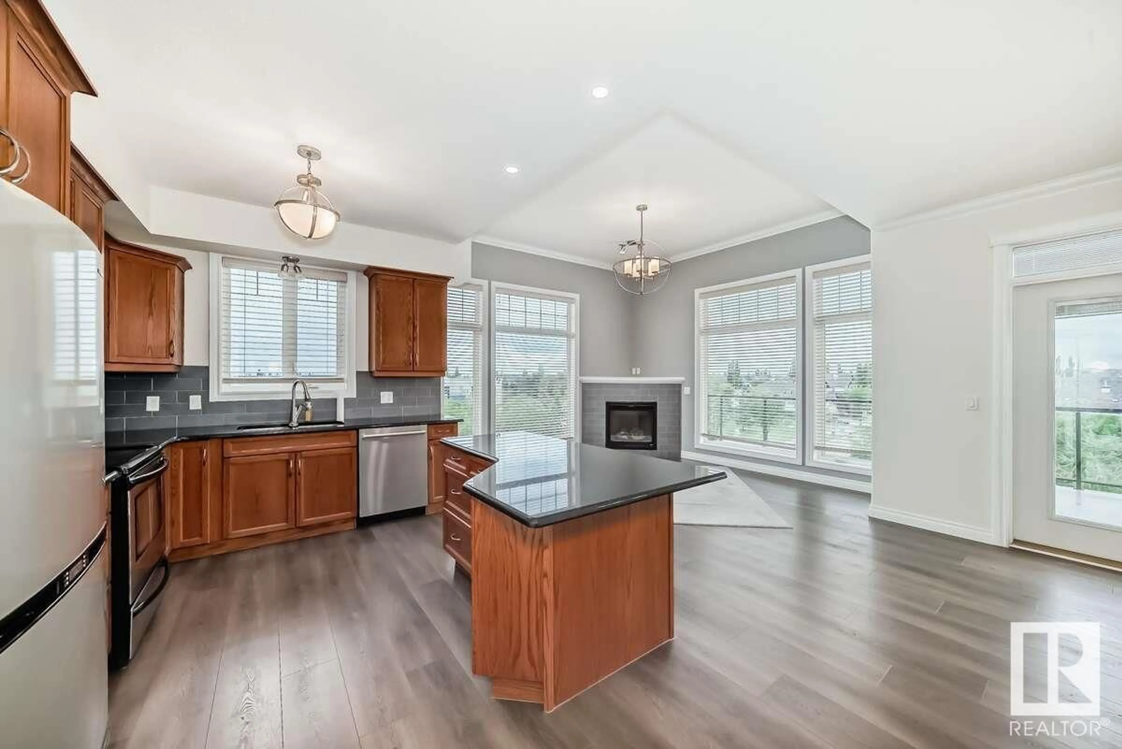 Open concept kitchen, unknown for #409 - 12408 15 AV, Edmonton Alberta T6W1X2