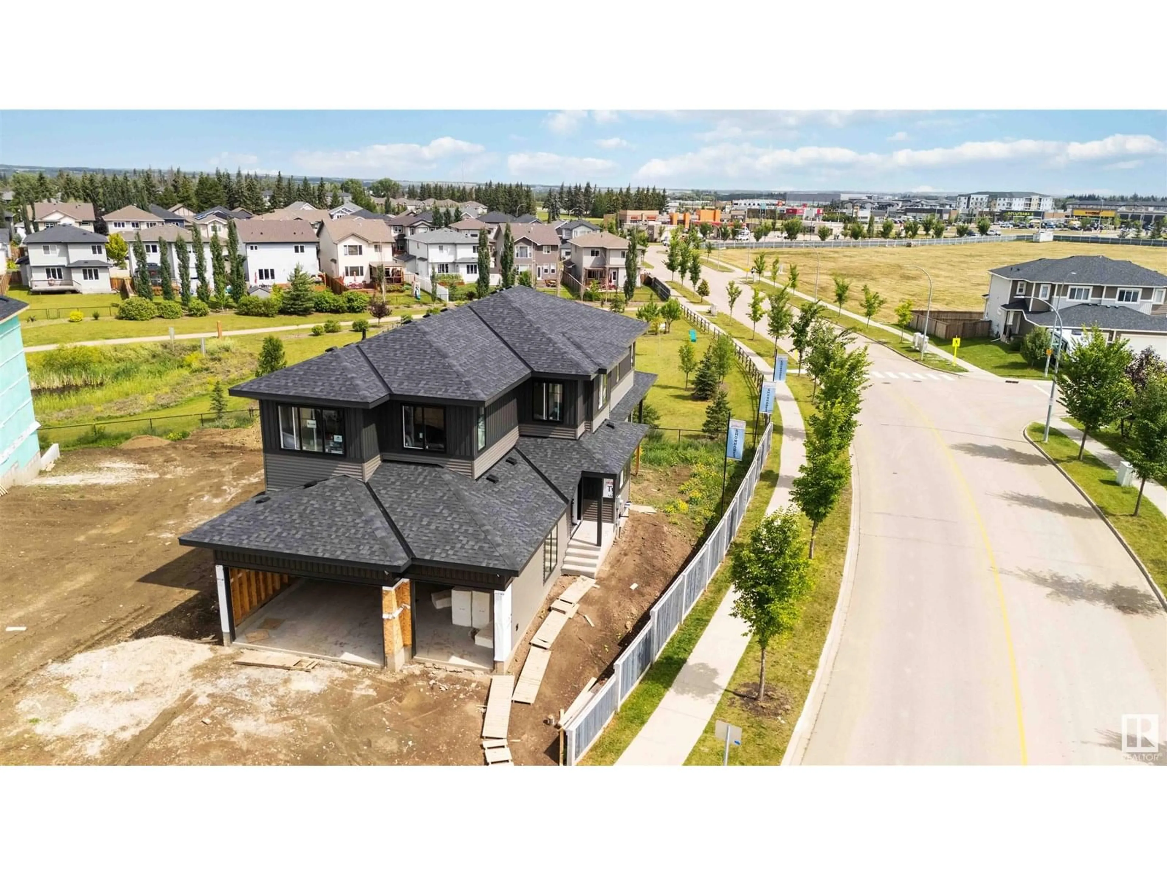 A pic from outside/outdoor area/front of a property/back of a property/a pic from drone, mountain view for 671 KING ST, Spruce Grove Alberta T7X4P7