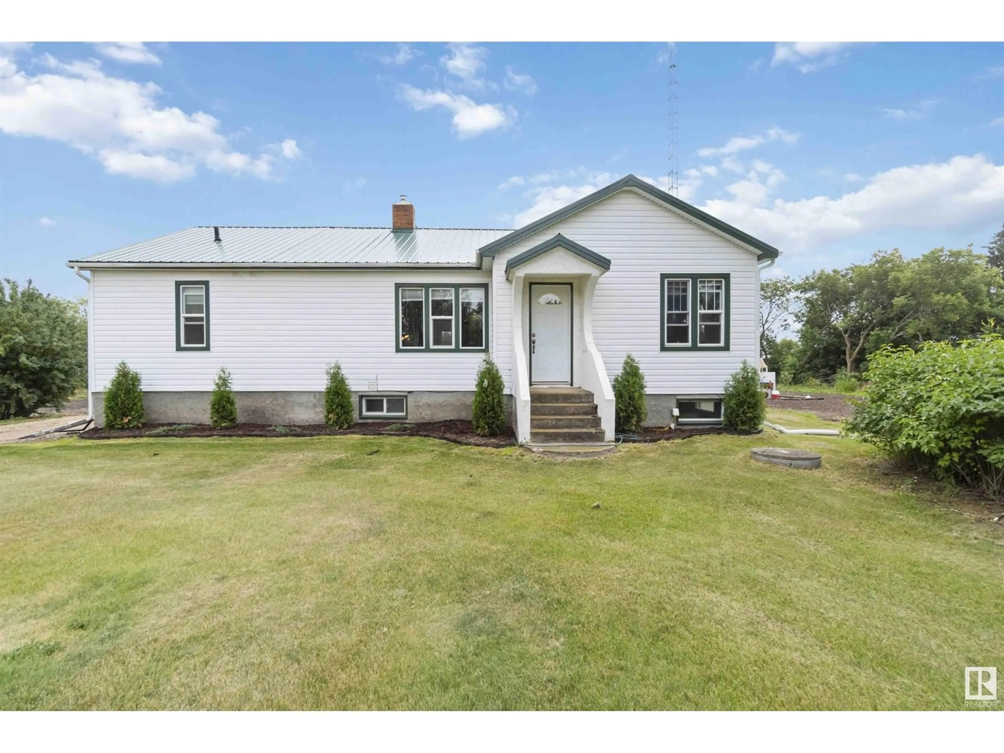 Home with vinyl exterior material, street for 58531 RR 200, Rural Thorhild County Alberta T0A3P0