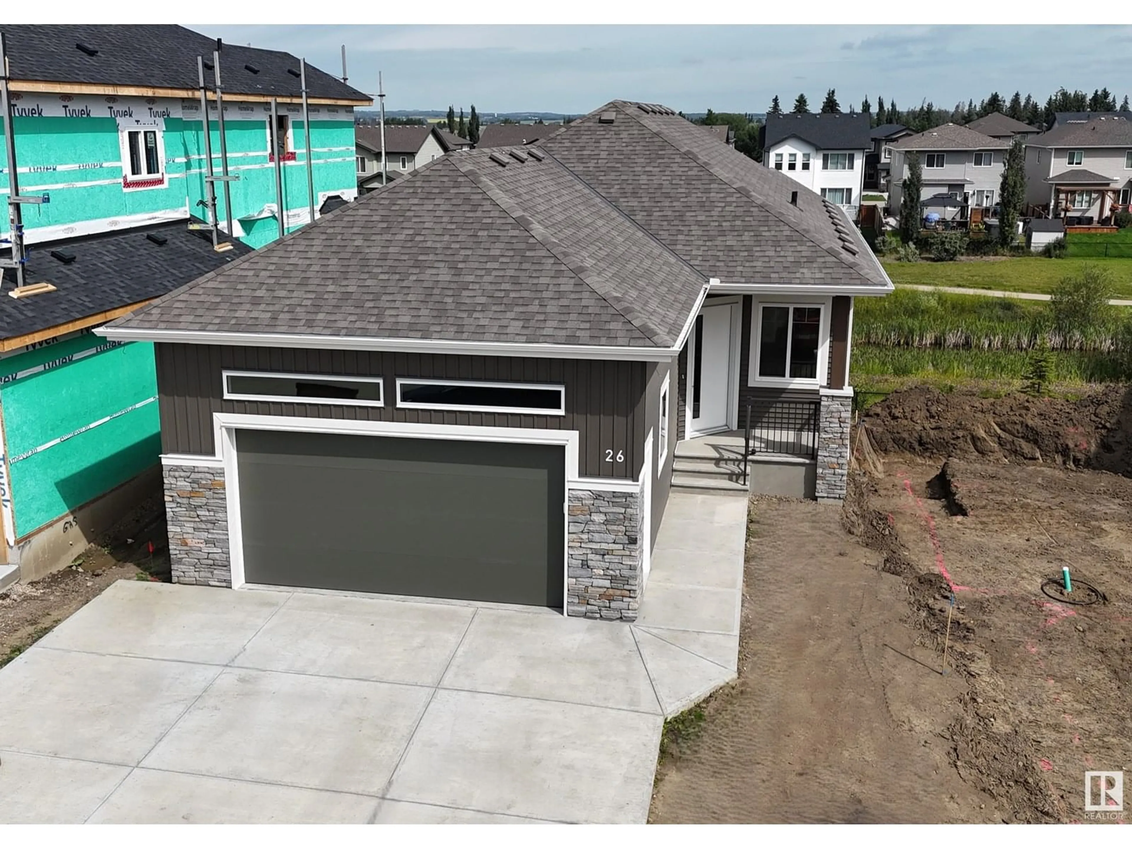 A pic from outside/outdoor area/front of a property/back of a property/a pic from drone, street for 26 HARLEY WY, Spruce Grove Alberta T7X0X4