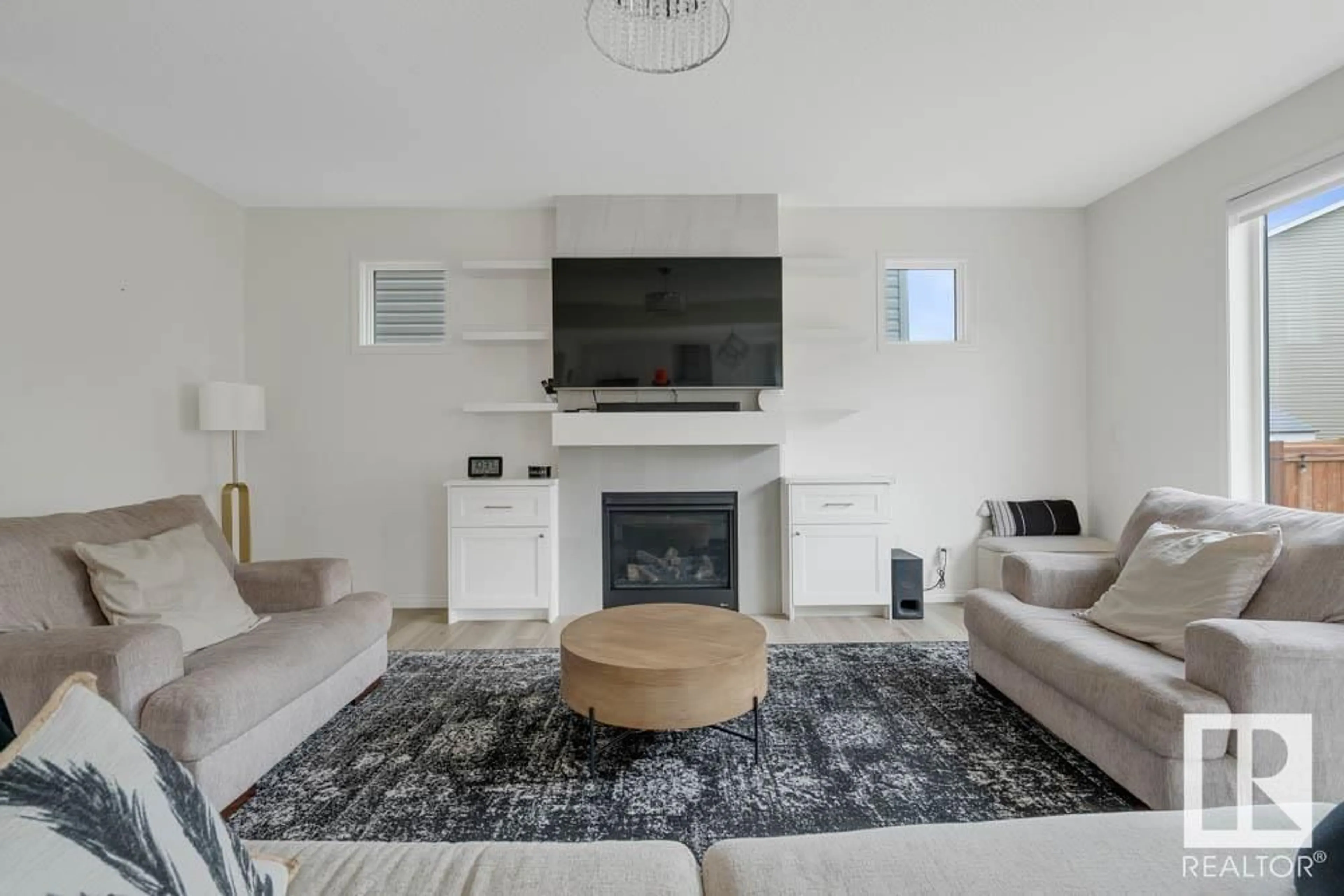 Living room with furniture, unknown for NW - 2008 206 ST, Edmonton Alberta T6M1M7