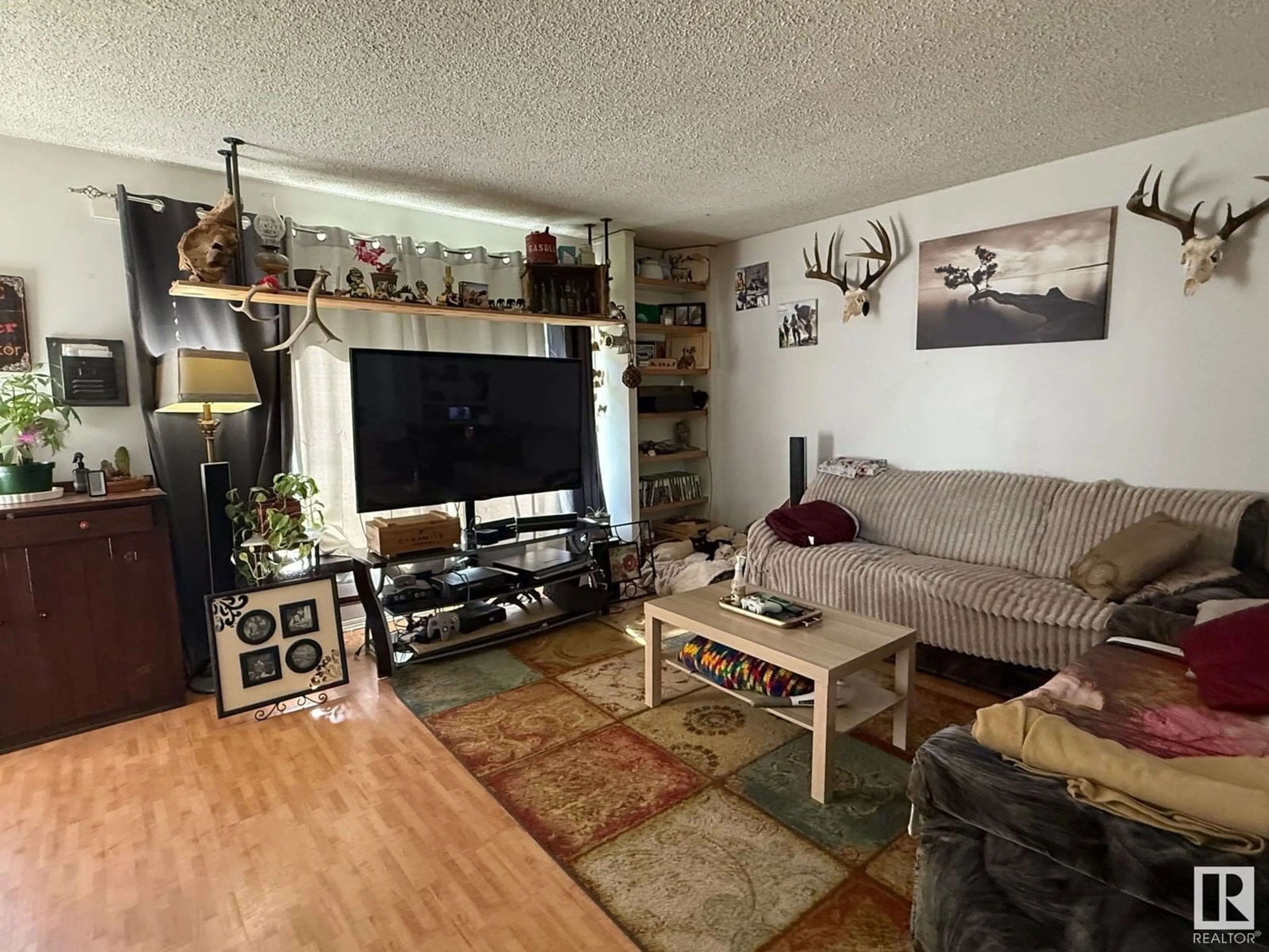 Living room with furniture, unknown for 4817 42 ST, Athabasca Town Alberta T9S1P7