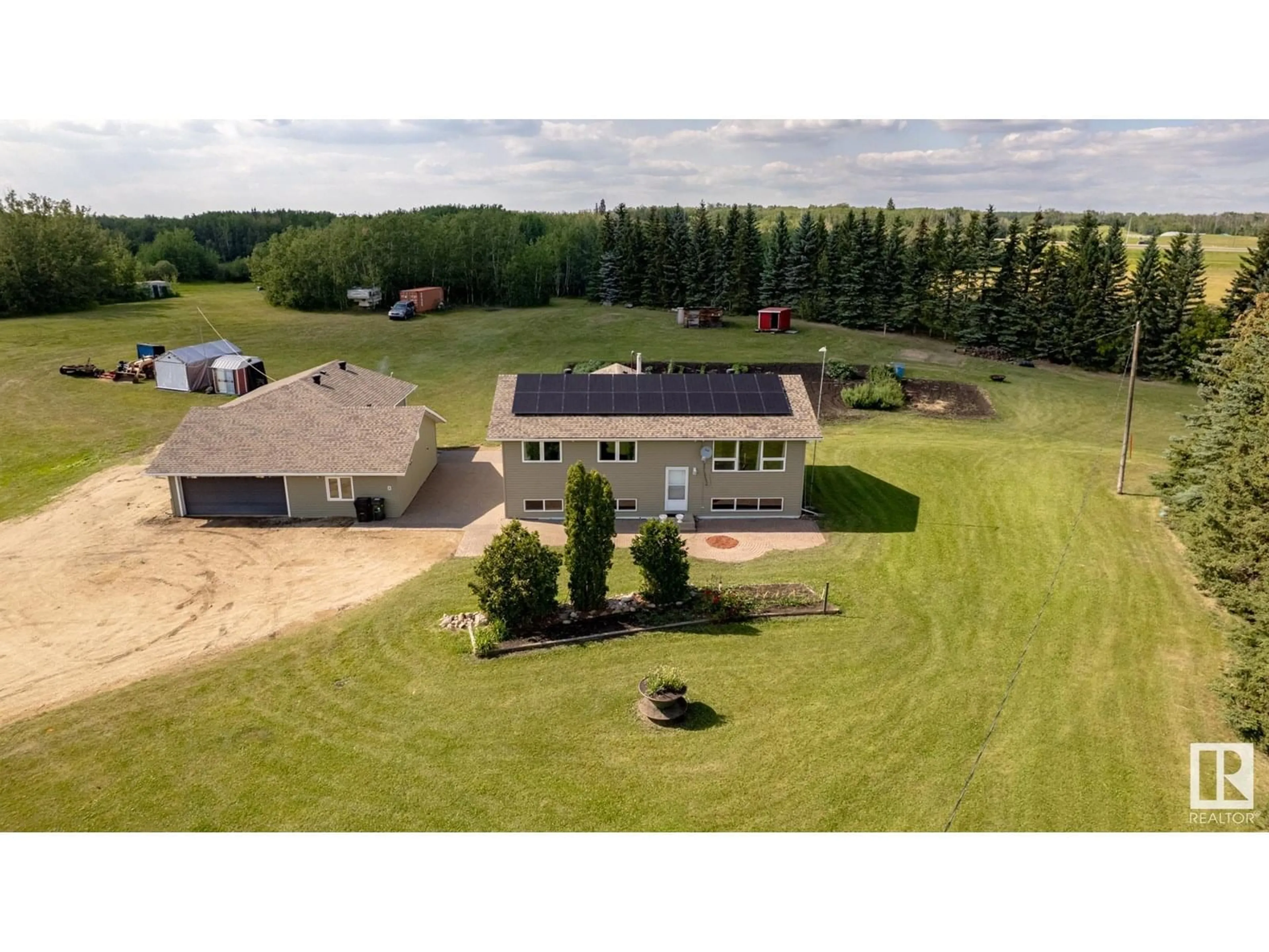 A pic from outside/outdoor area/front of a property/back of a property/a pic from drone, building for 14 - 53158 RGE ROAD 215, Rural Strathcona County Alberta T0B0E0