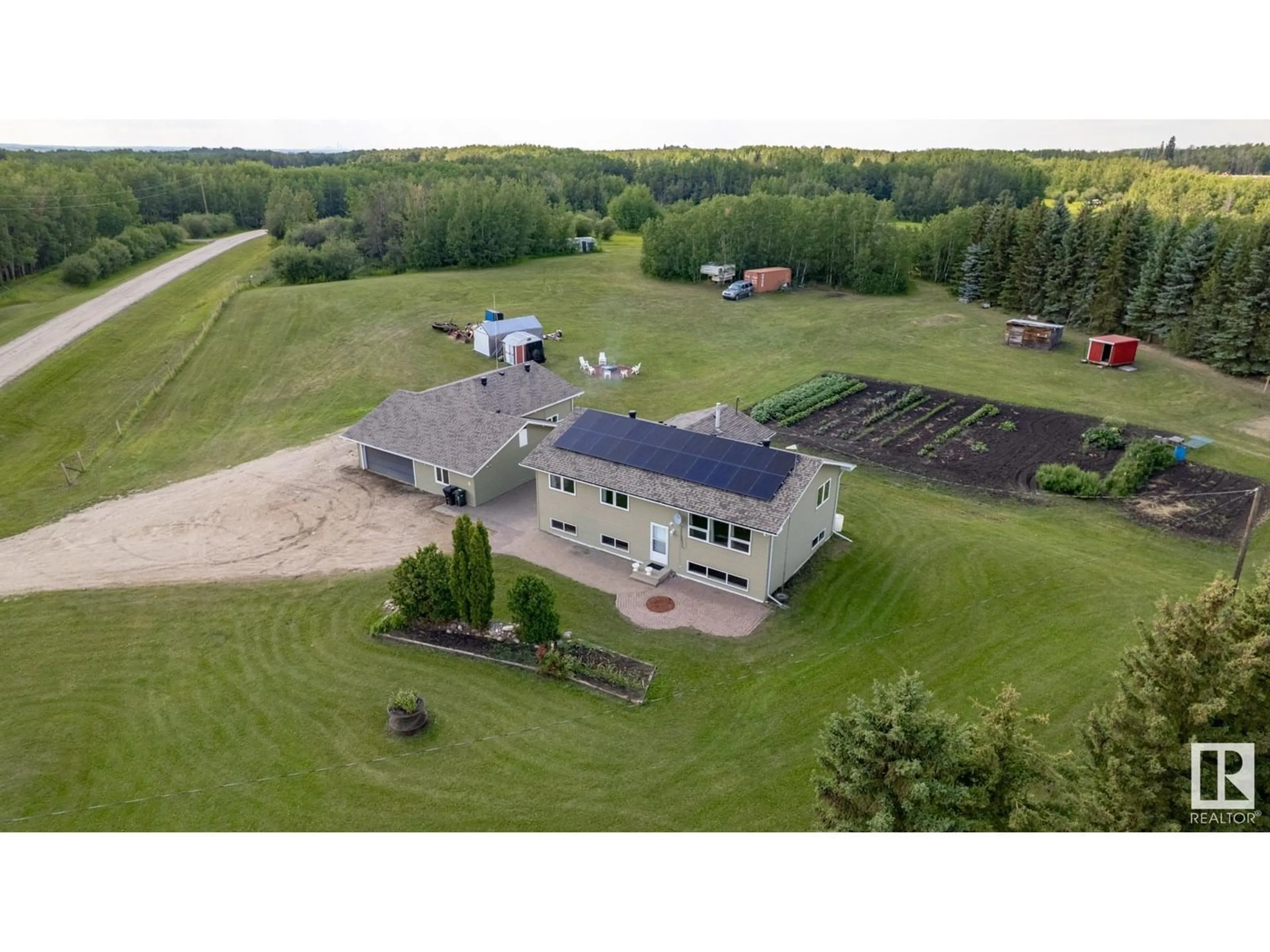 A pic from outside/outdoor area/front of a property/back of a property/a pic from drone, building for 14 - 53158 RGE ROAD 215, Rural Strathcona County Alberta T0B0E0
