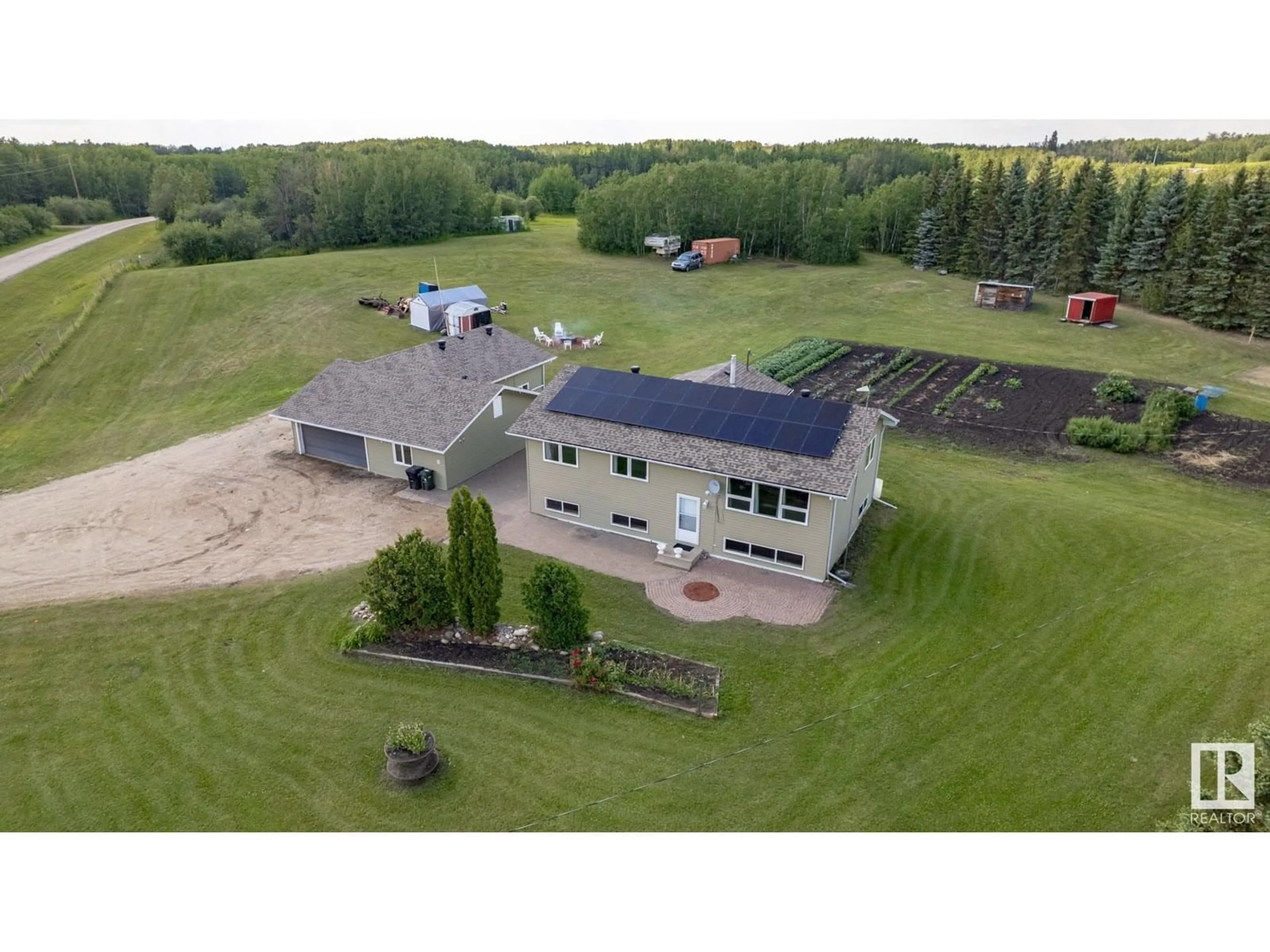 A pic from outside/outdoor area/front of a property/back of a property/a pic from drone, building for 14 - 53158 RGE ROAD 215, Rural Strathcona County Alberta T0B0E0