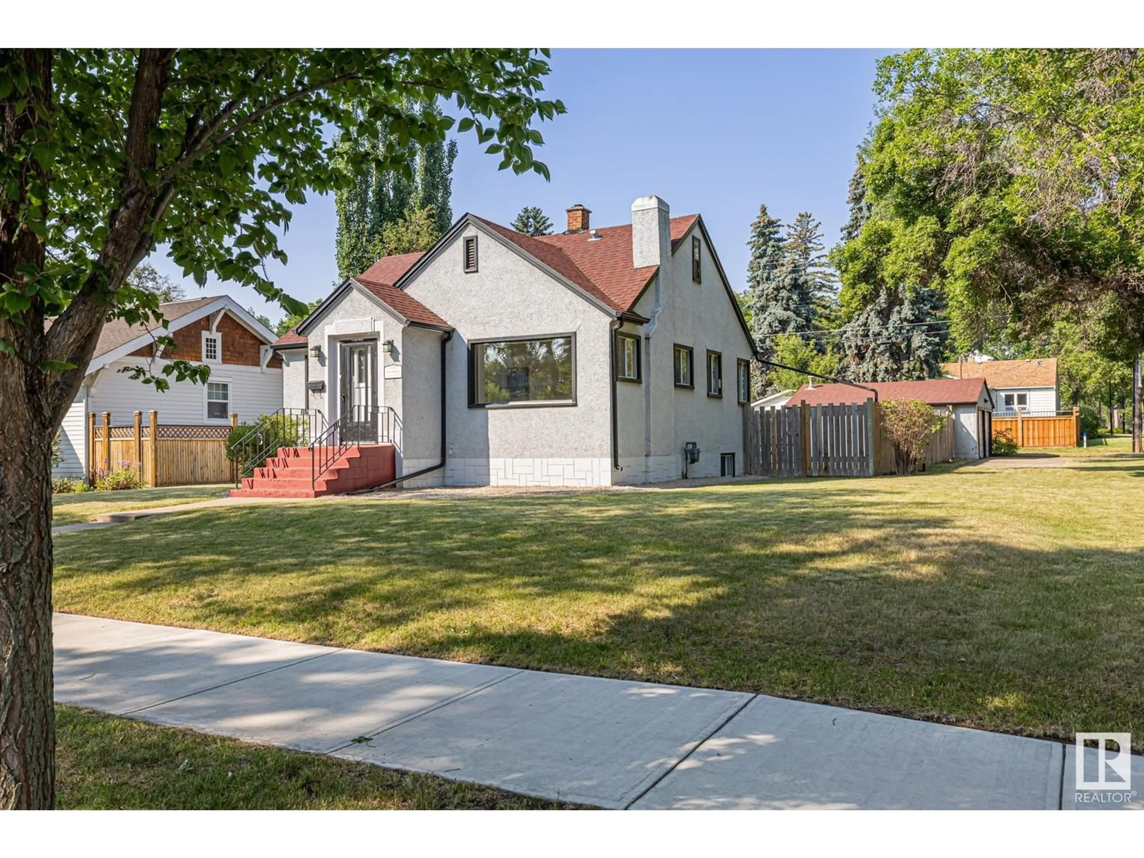 Home with brick exterior material, street for 11246 62 ST, Edmonton Alberta T5W4B9
