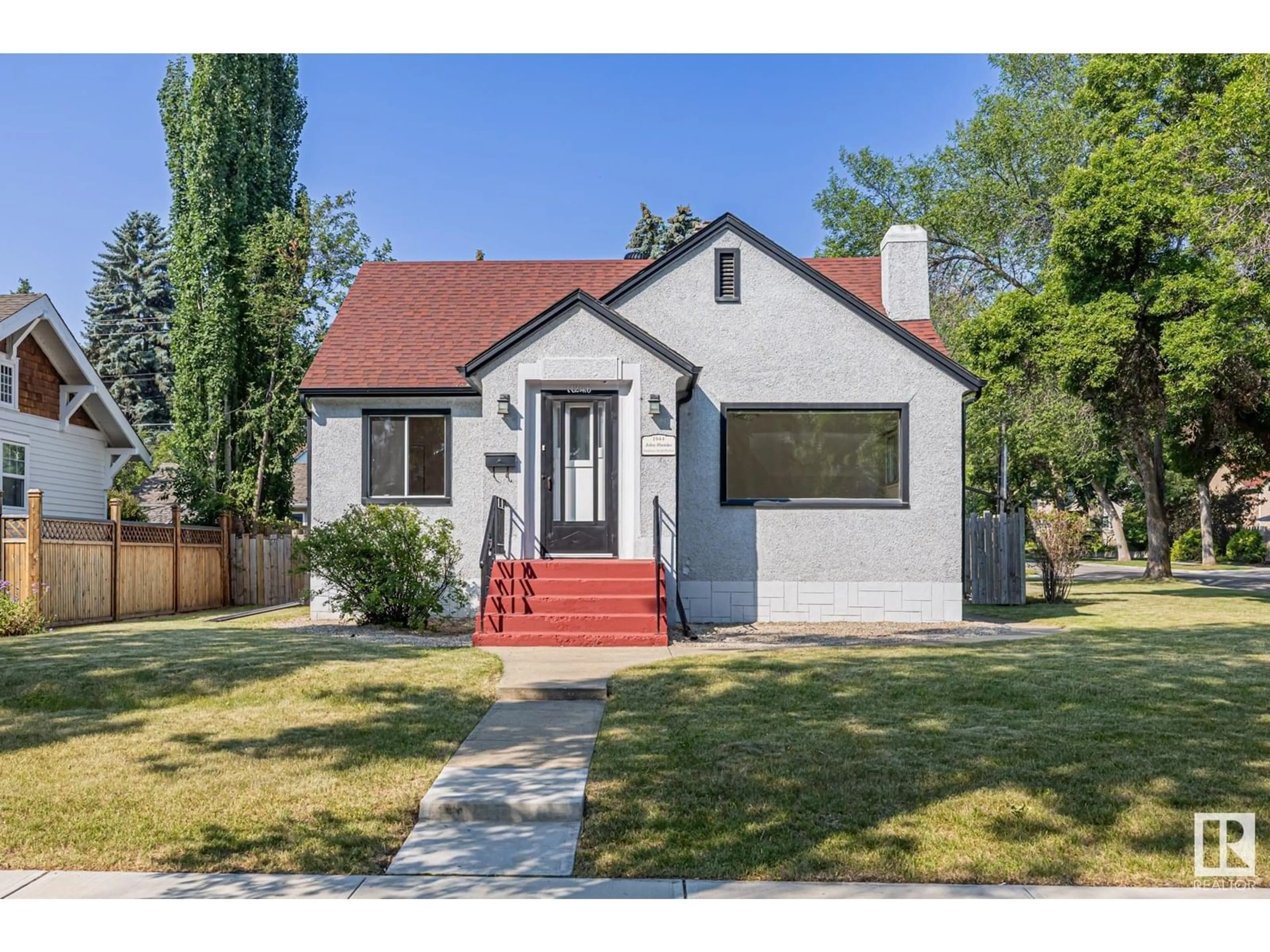 Home with brick exterior material, street for 11246 62 ST, Edmonton Alberta T5W4B9