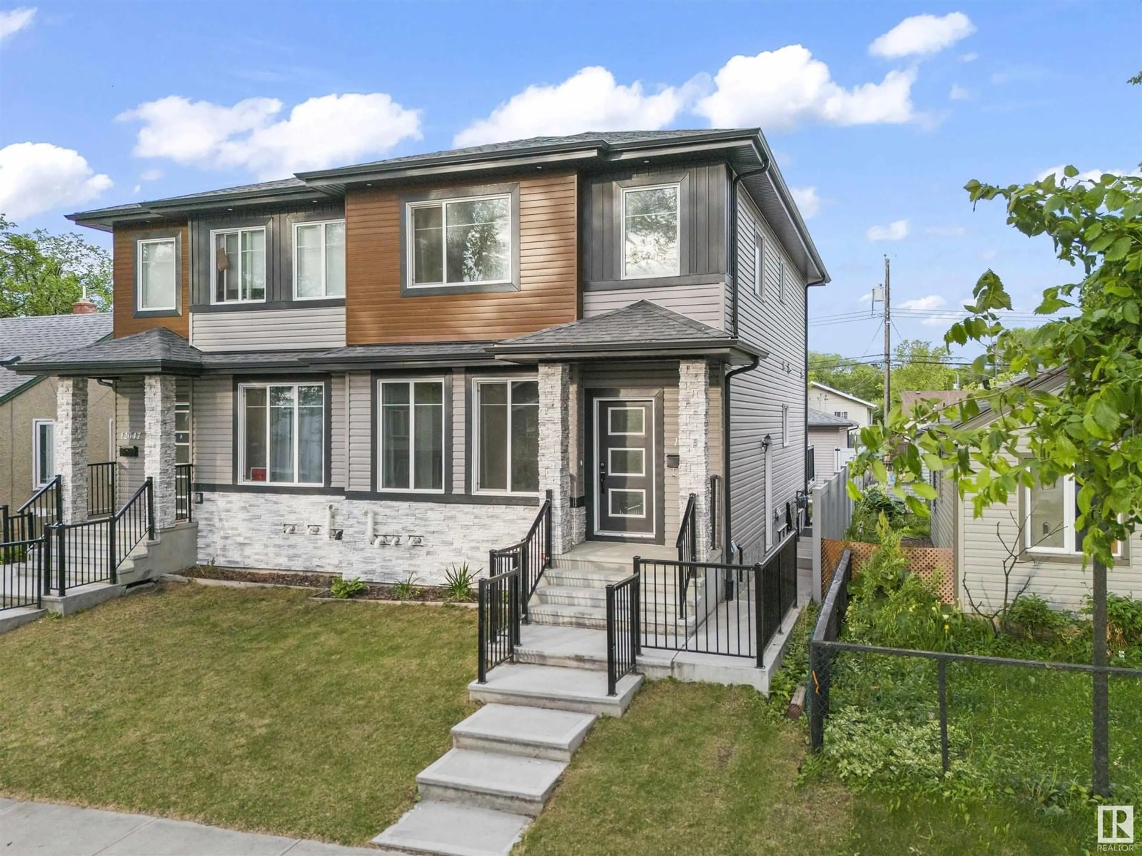 Home with vinyl exterior material, street for NW - 12045 65 ST, Edmonton Alberta T5W4L6