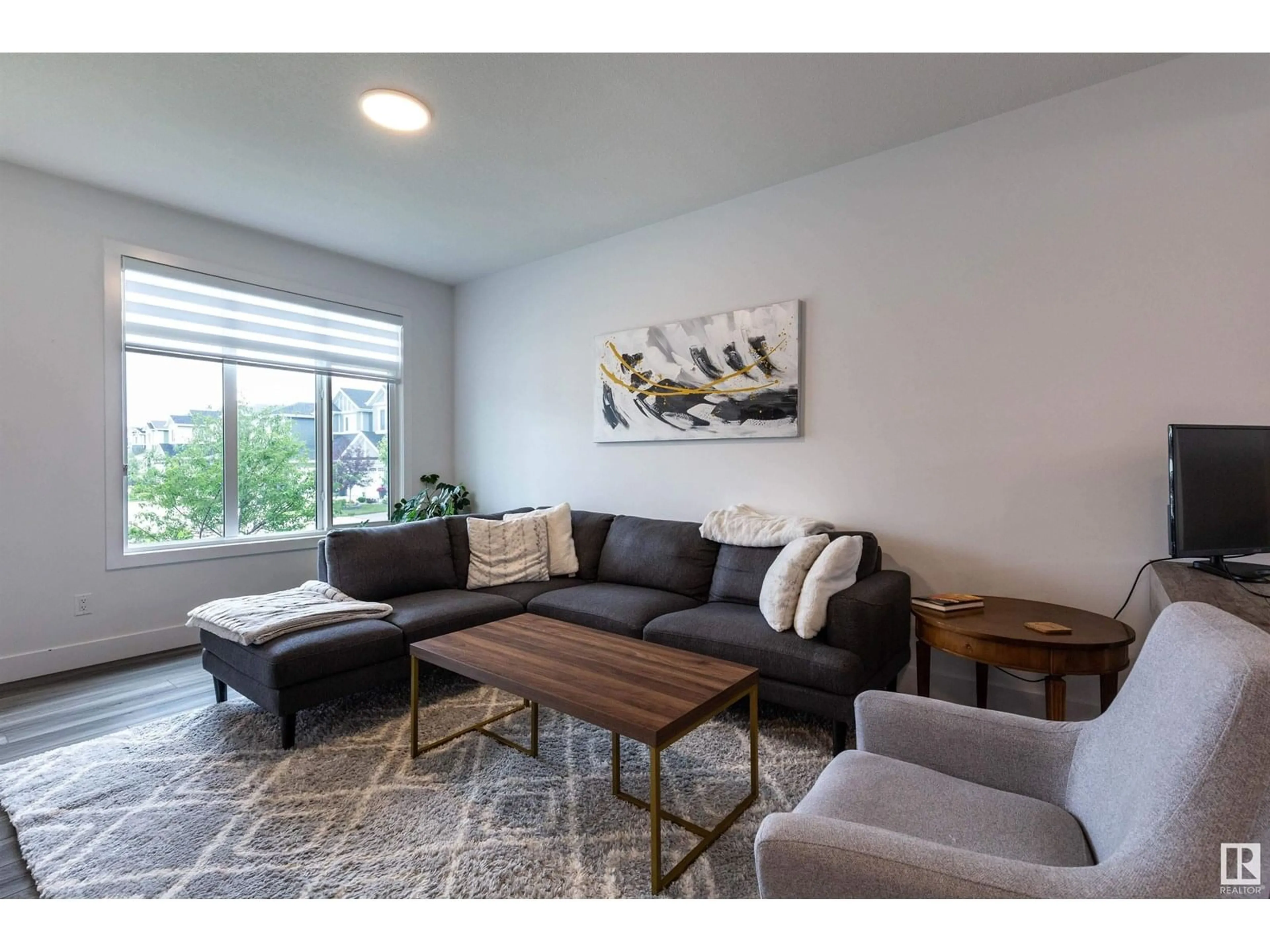 Living room with furniture, unknown for 553 GLENRIDDING RAVINE DR, Edmonton Alberta T6W4P1