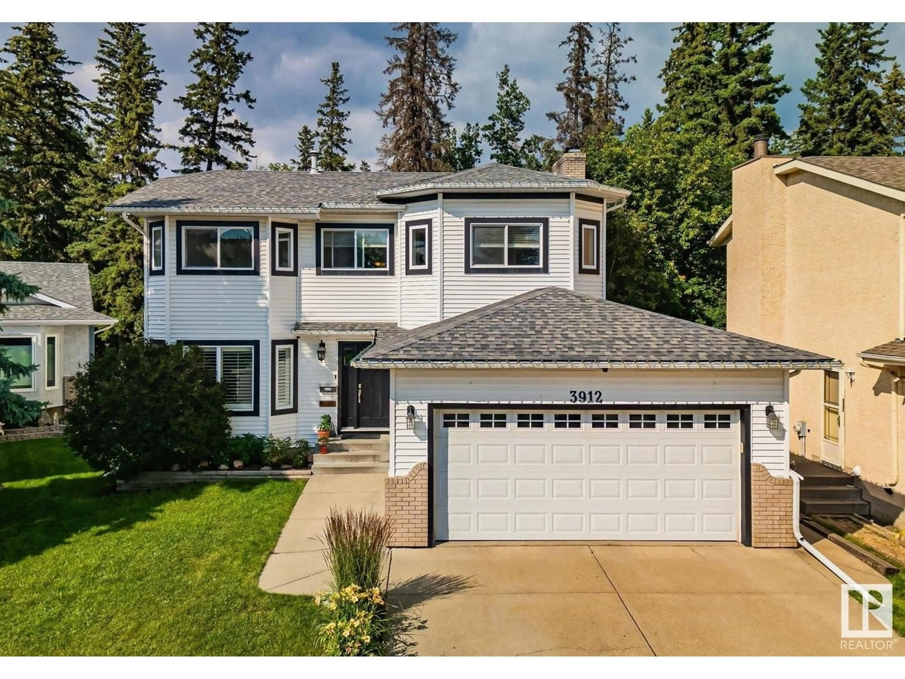 Home with vinyl exterior material, street for 3912 26A AV, Edmonton Alberta T6L6G2