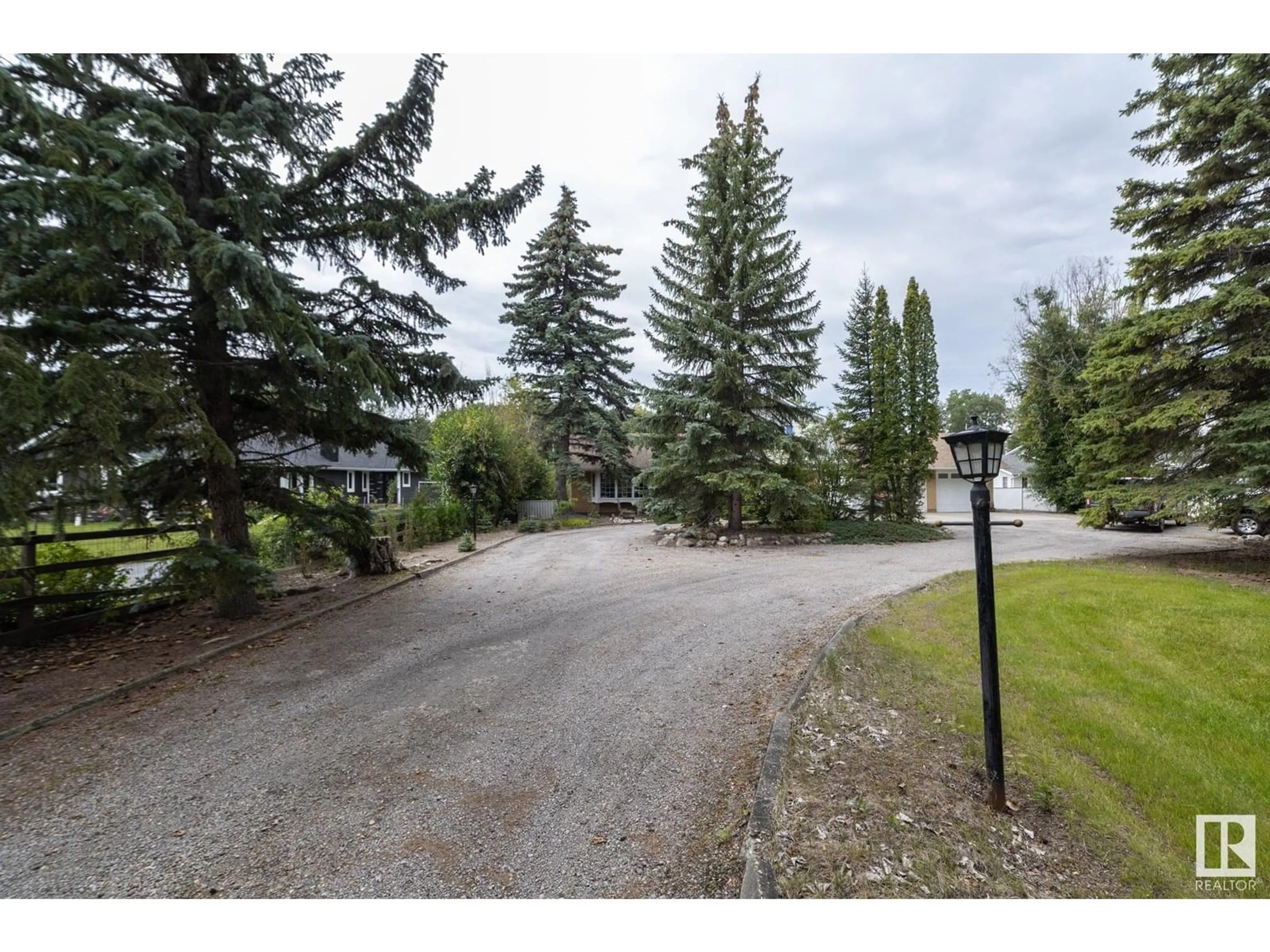 A pic from outside/outdoor area/front of a property/back of a property/a pic from drone, street for 10 RGE ROAD 261, Rural Parkland County Alberta T5N3G4