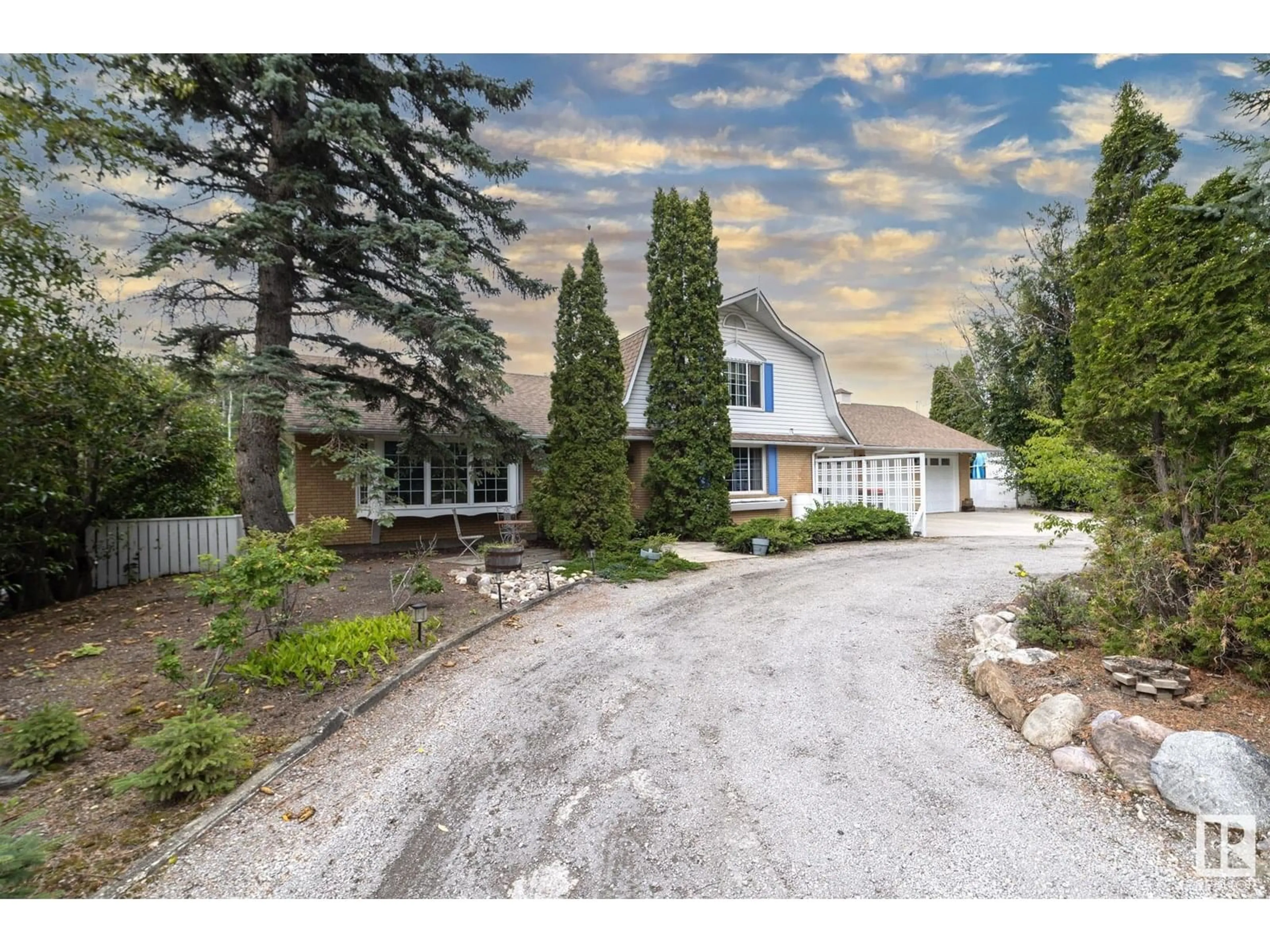 A pic from outside/outdoor area/front of a property/back of a property/a pic from drone, street for 10 RGE ROAD 261, Rural Parkland County Alberta T5N3G4