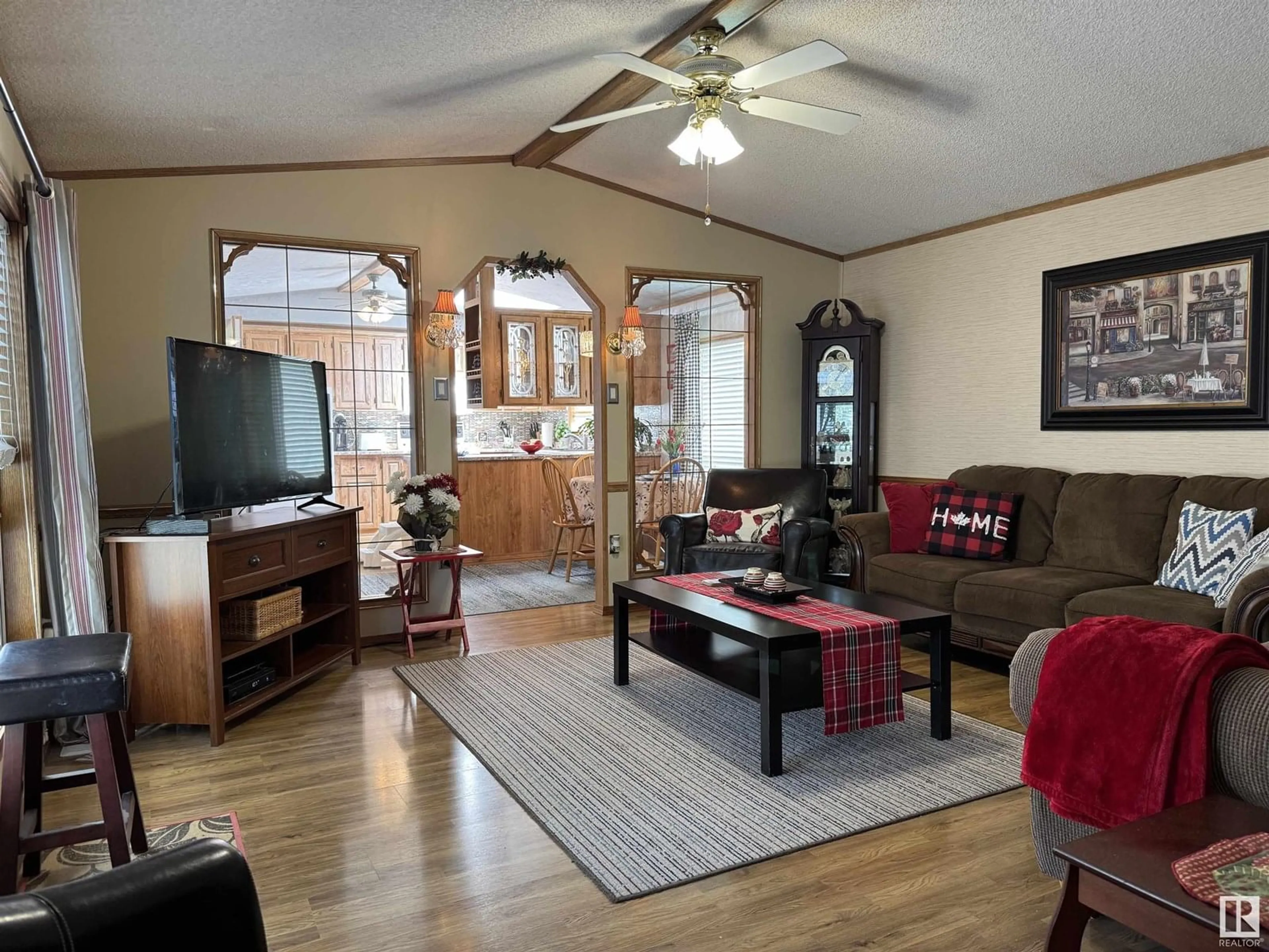 Living room with furniture, wood/laminate floor for 5 - 3400 48 ST, Stony Plain Alberta T7Z1R9